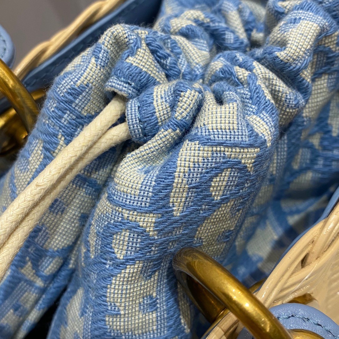 D*or medium lady D*or bag in wicker and light blue oblique jacquard
