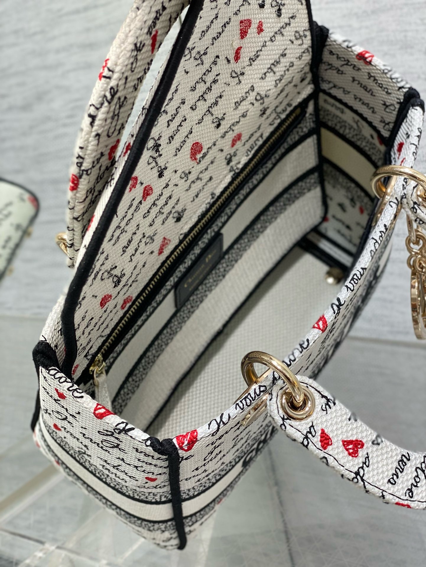 D*or lady d-lite medium bag in white and red je vous adore motif