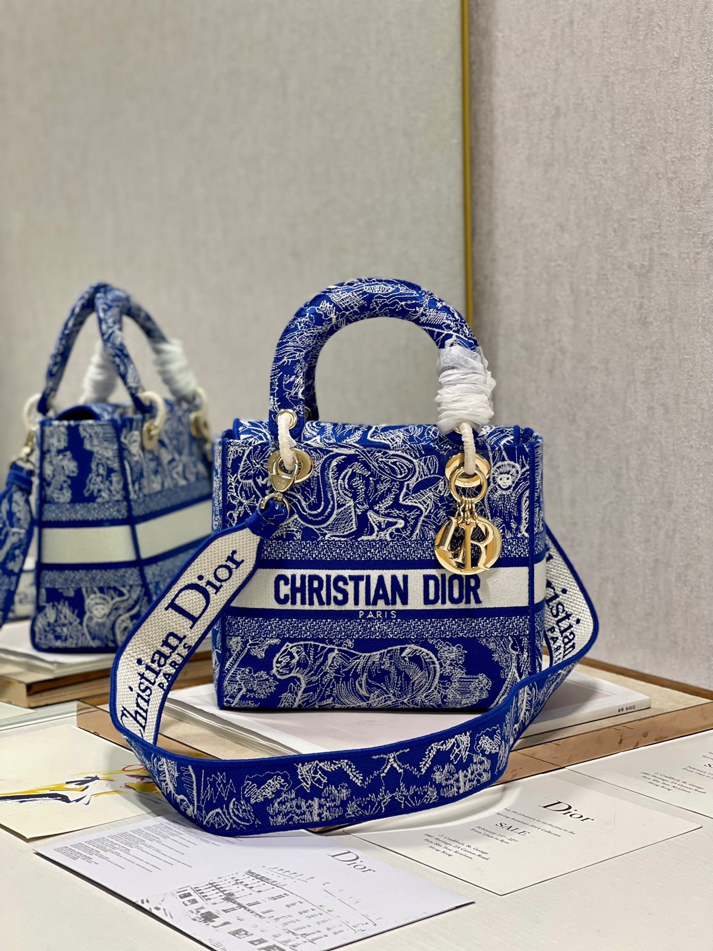 D*or medium lady d-lite bag in fluorescent blue toile de jouy reverse embroidery