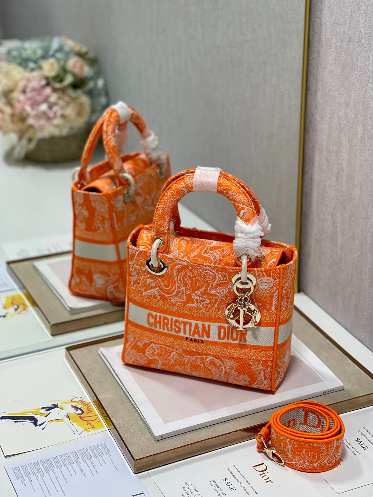 D*or medium lady d-lite bag in fluorescent orange toile de jouy reverse embroidery