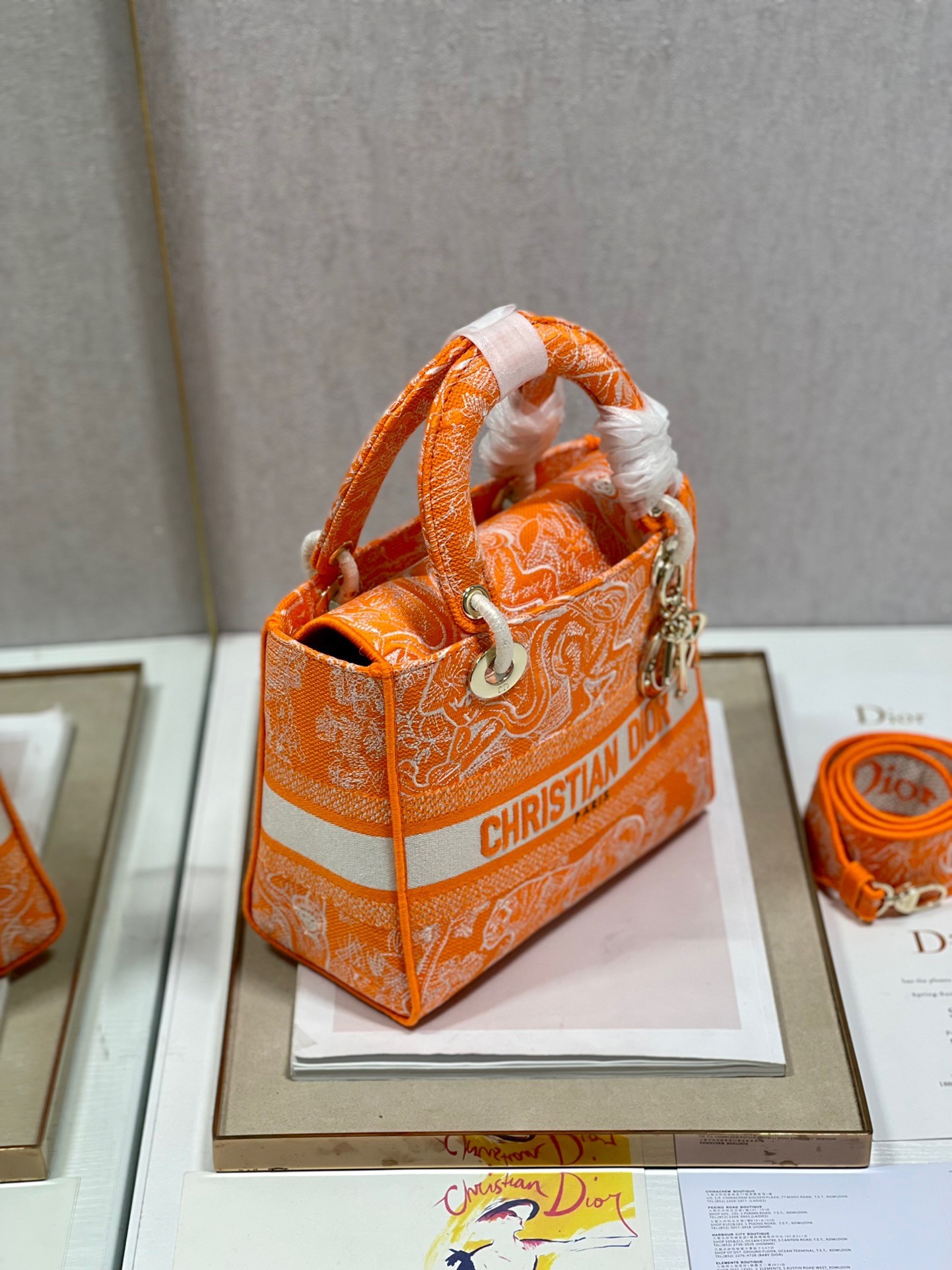 D*or medium lady d-lite bag in fluorescent orange toile de jouy reverse embroidery