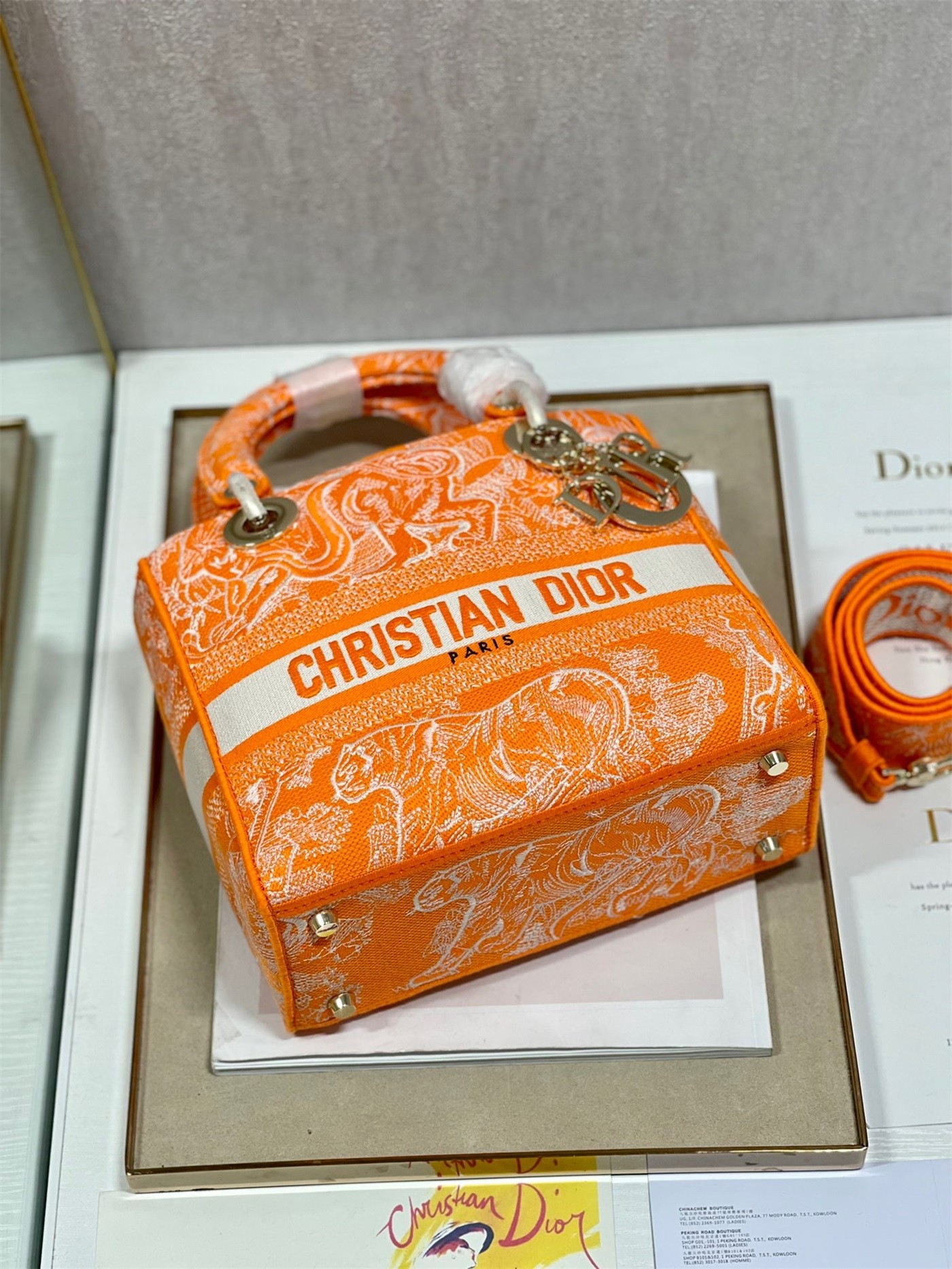 D*or medium lady d-lite bag in fluorescent orange toile de jouy reverse embroidery