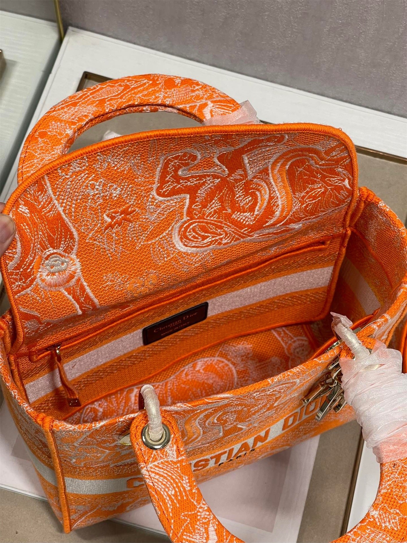 D*or medium lady d-lite bag in fluorescent orange toile de jouy reverse embroidery