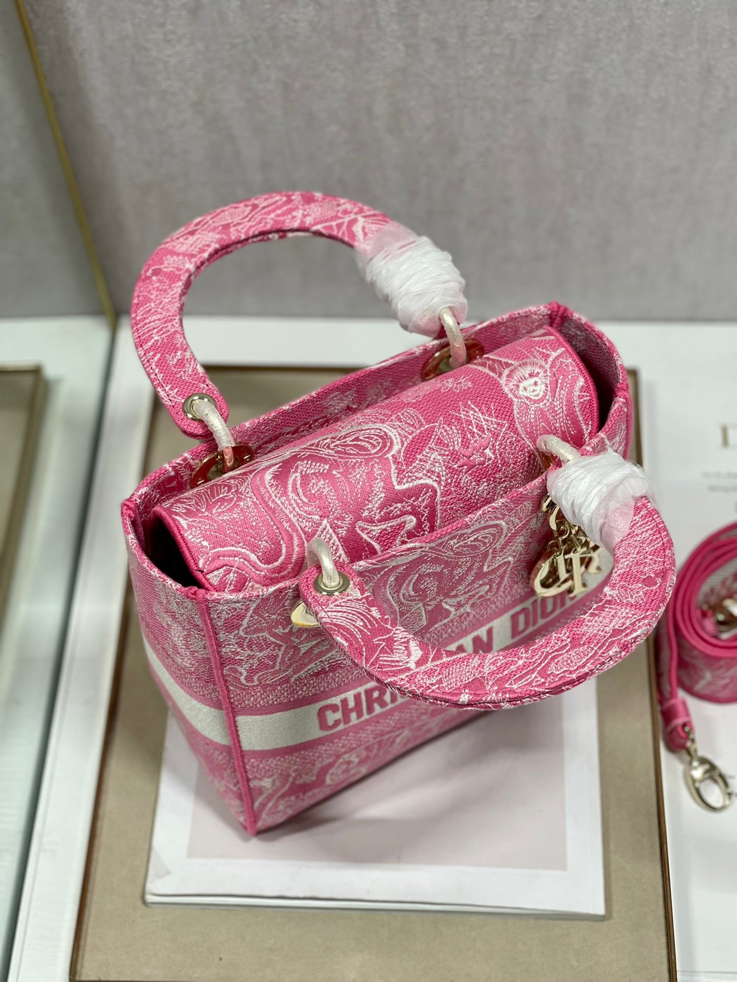 D*or medium lady d-lite bag in fluorescent pink toile de jouy reverse embroidery