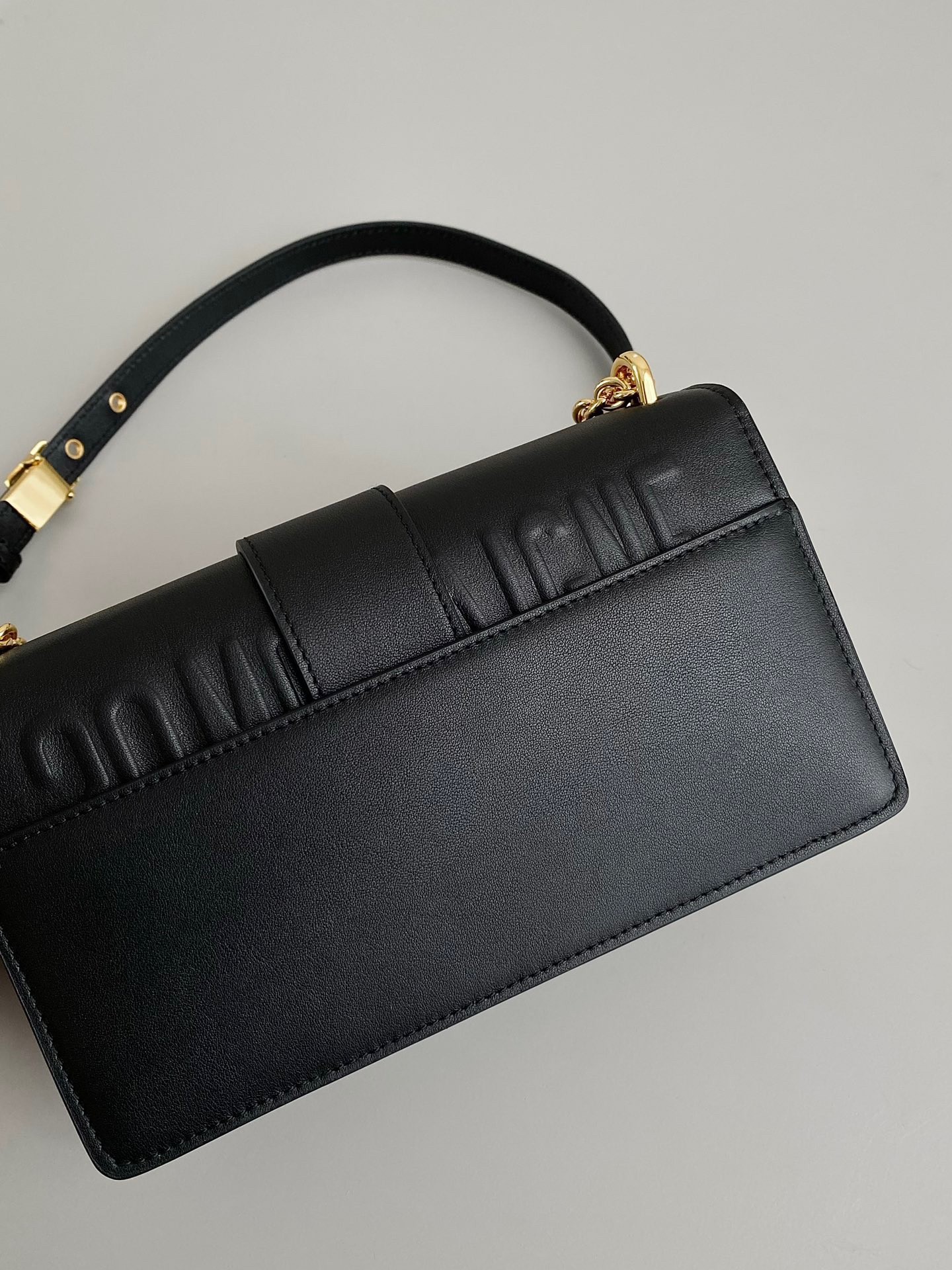 D*or 30 montaigne east-west bag with chain in black calfskin