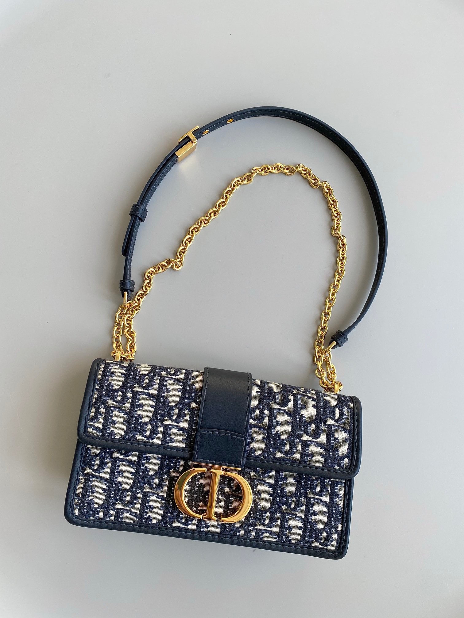 D*or 30 montaigne east-west bag with chain in blue oblique jacquard