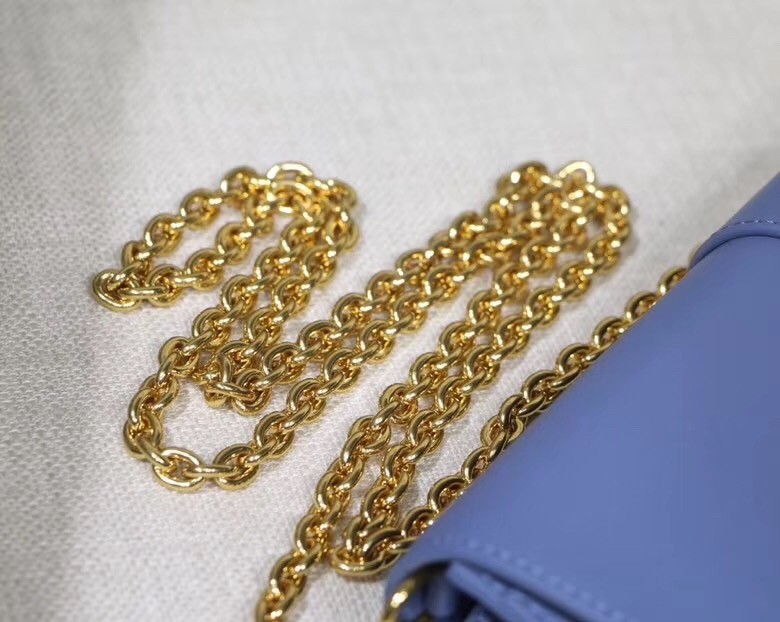 D*or 30 montaigne clutch bag in denim blue calfskin