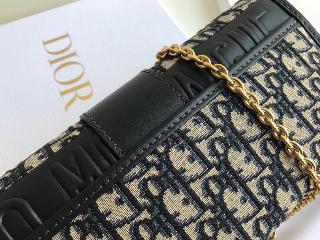 D*or 30 montaigne clutch bag in blue oblique canvas