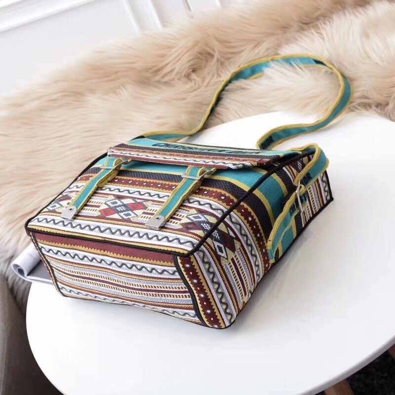 D*or D*orcamp messenger bag in turquoise embroidered canvas