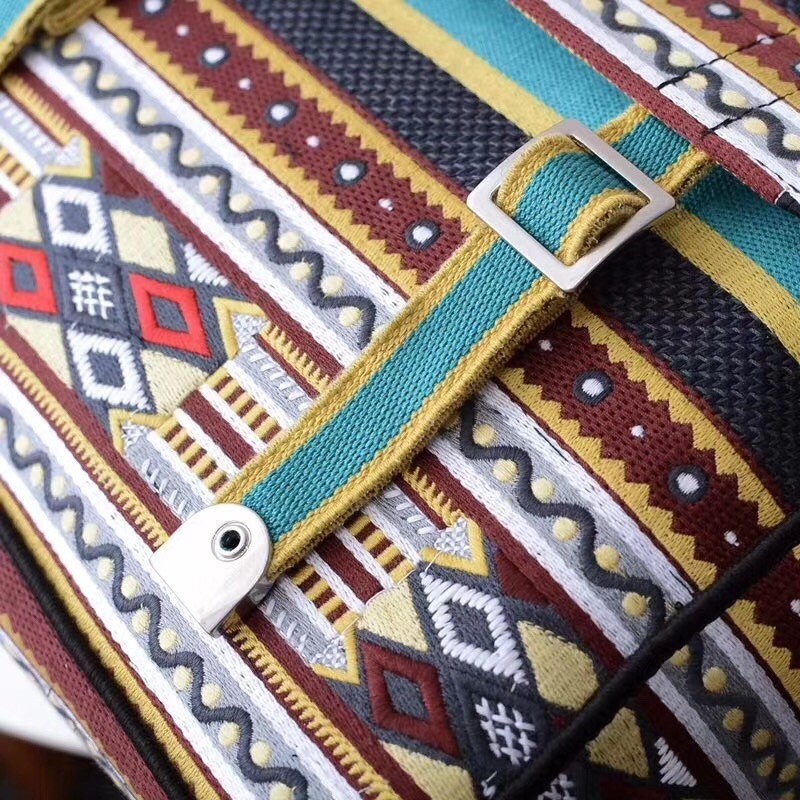 D*or D*orcamp messenger bag in turquoise embroidered canvas