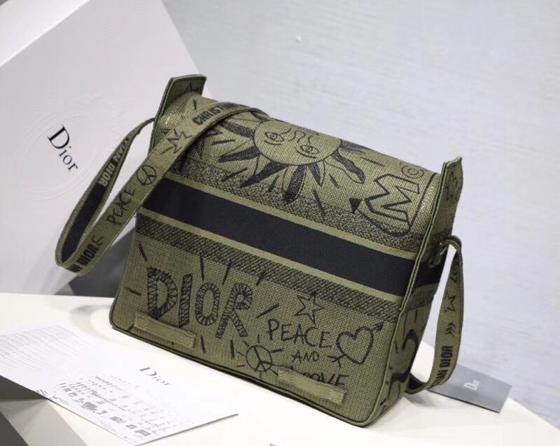 D*or D*orcamp messenger bag in green embroidered canvas