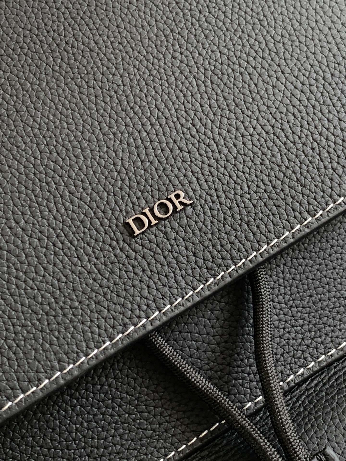 D*or saddle backpack with flap in black grained calfskin