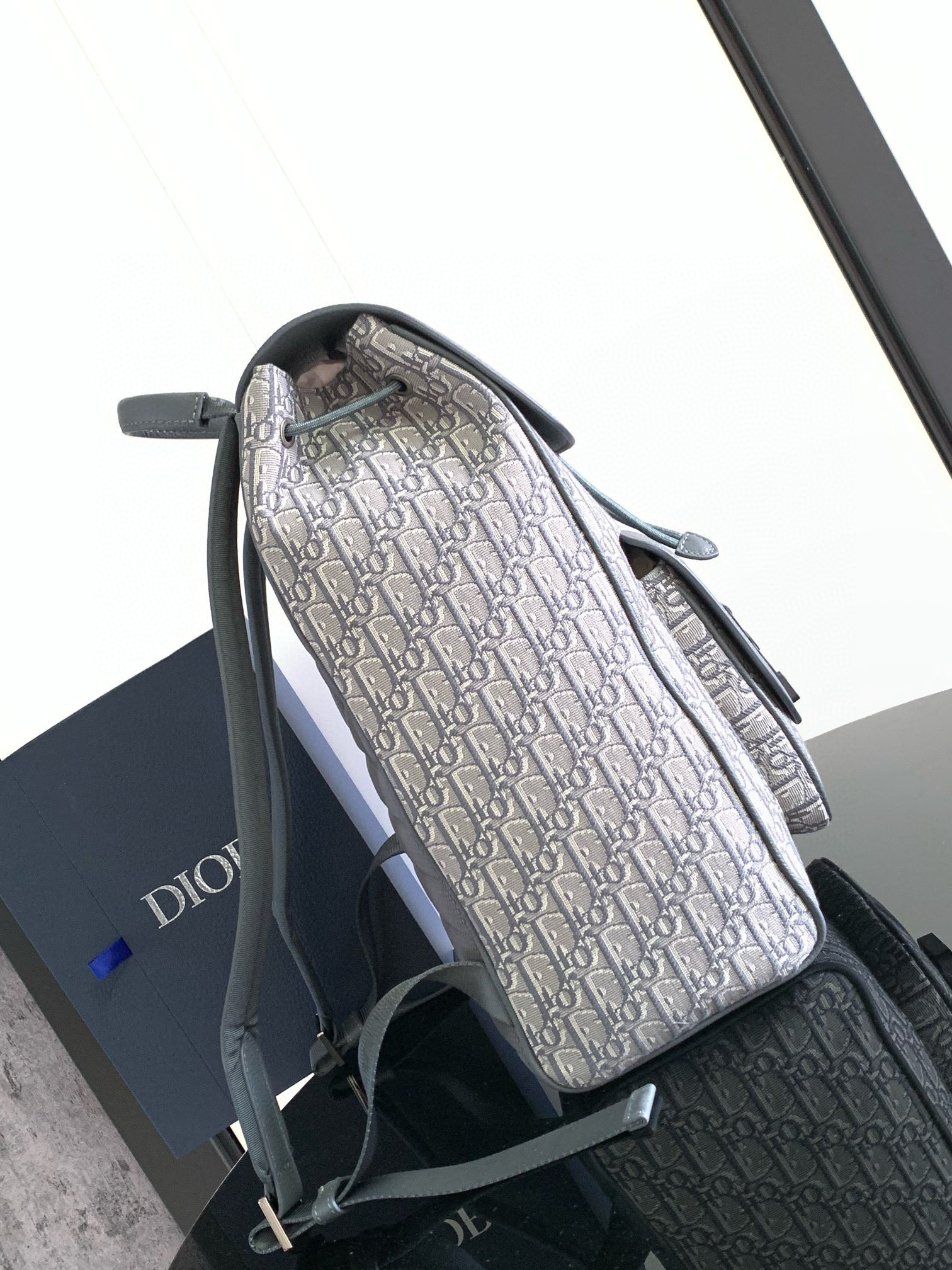 D*or saddle backpack with flap in grey oblique jacquard