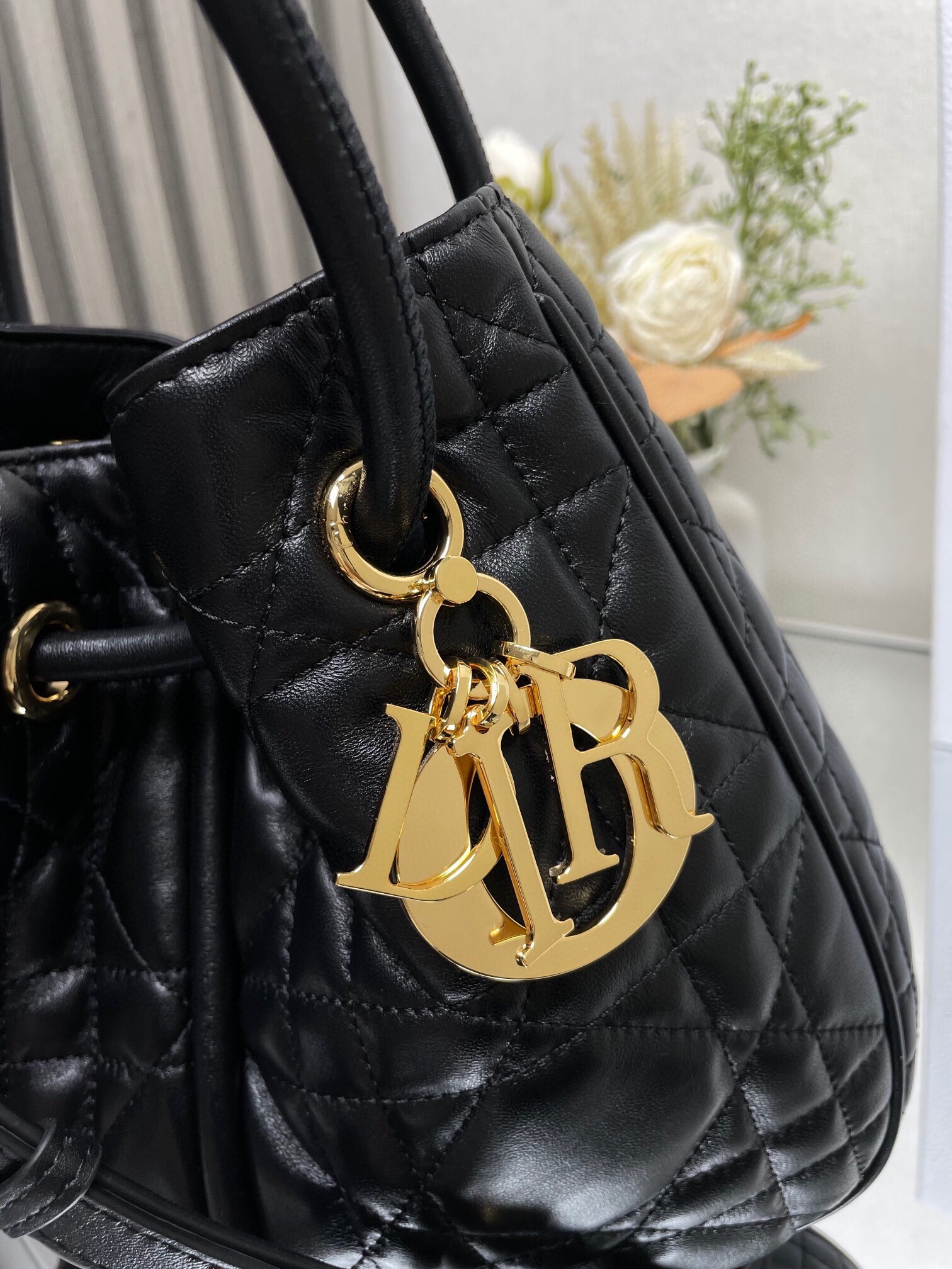 D*or nolita medium bag in black macrocannage lambskin