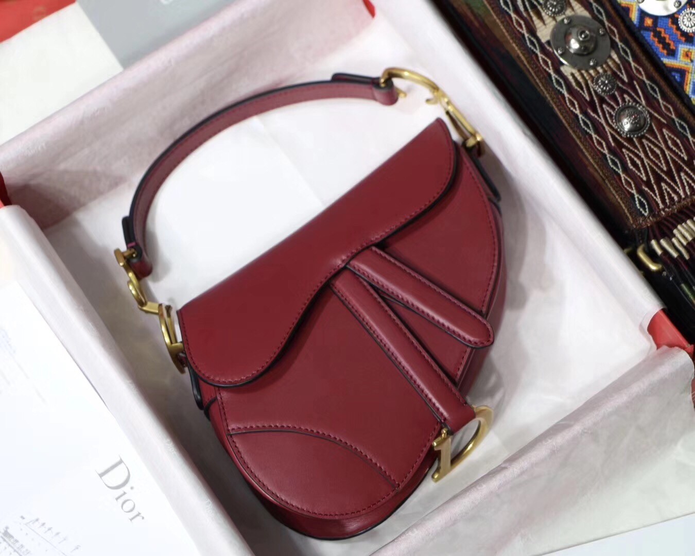 D*or mini saddle bag in red calfskin