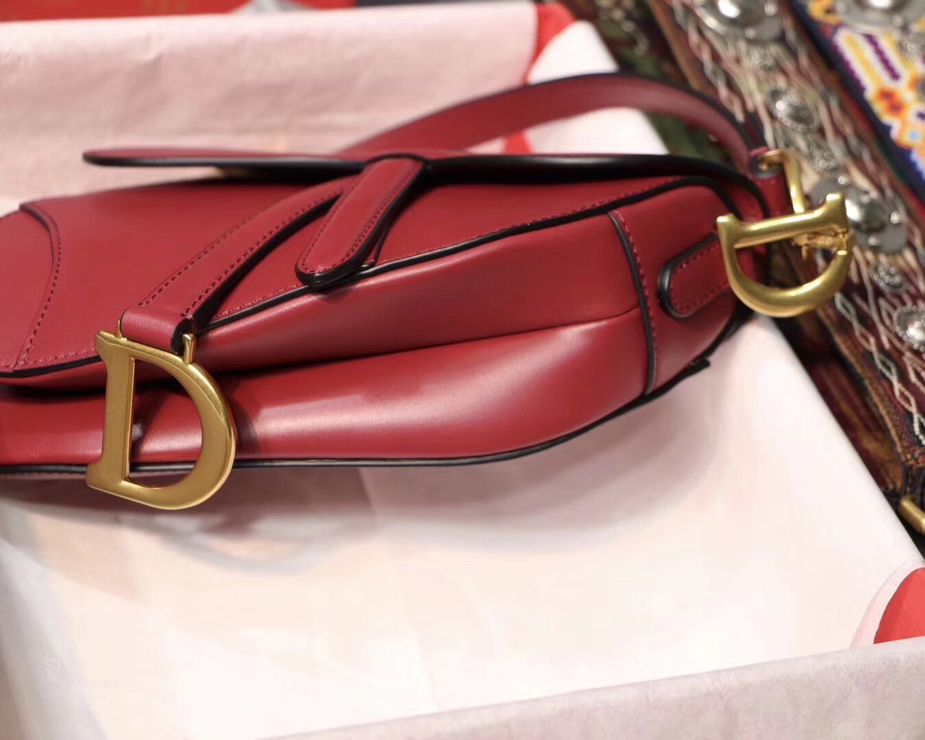 D*or mini saddle bag in red calfskin