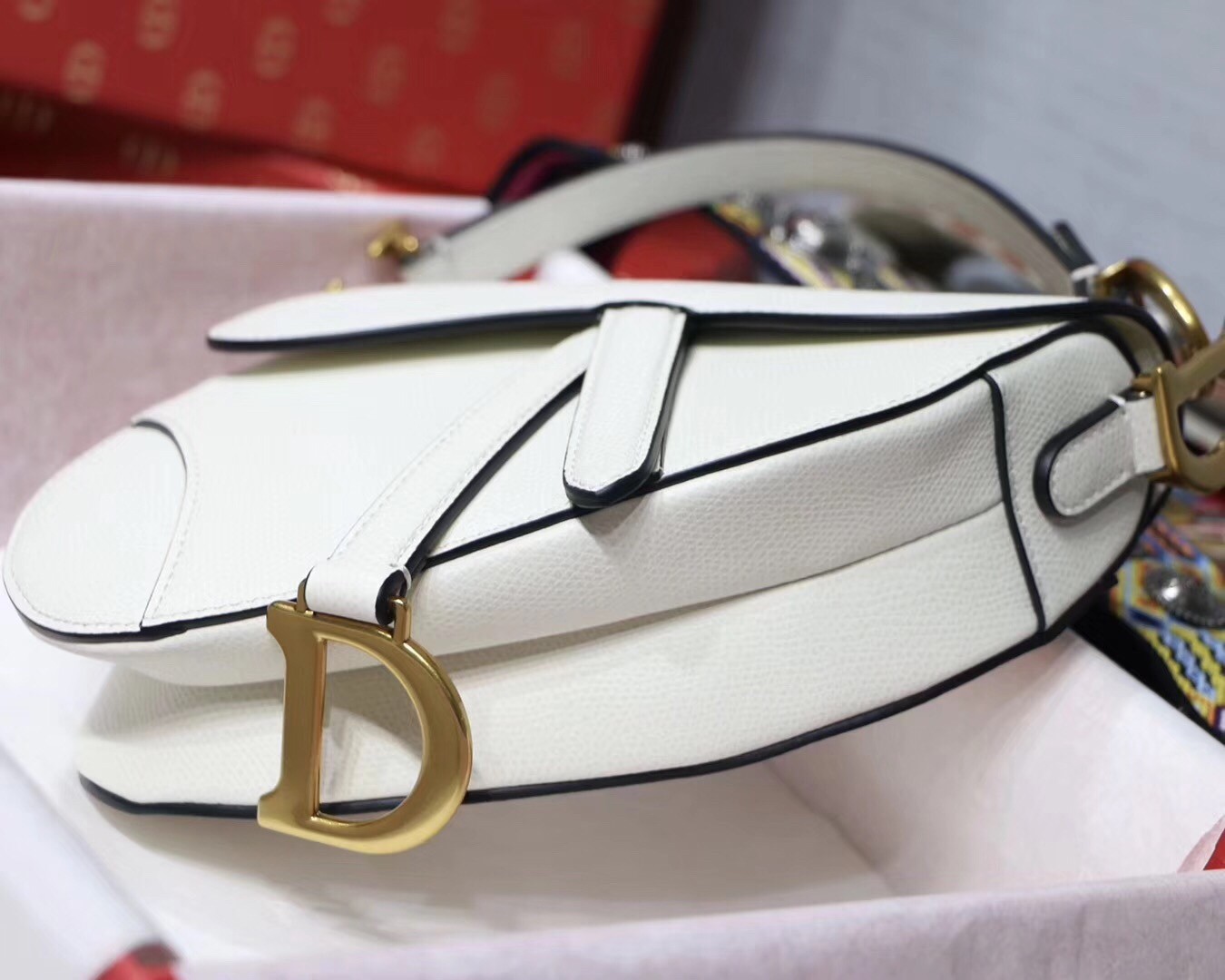 D*or mini saddle bag in white grained calfskin