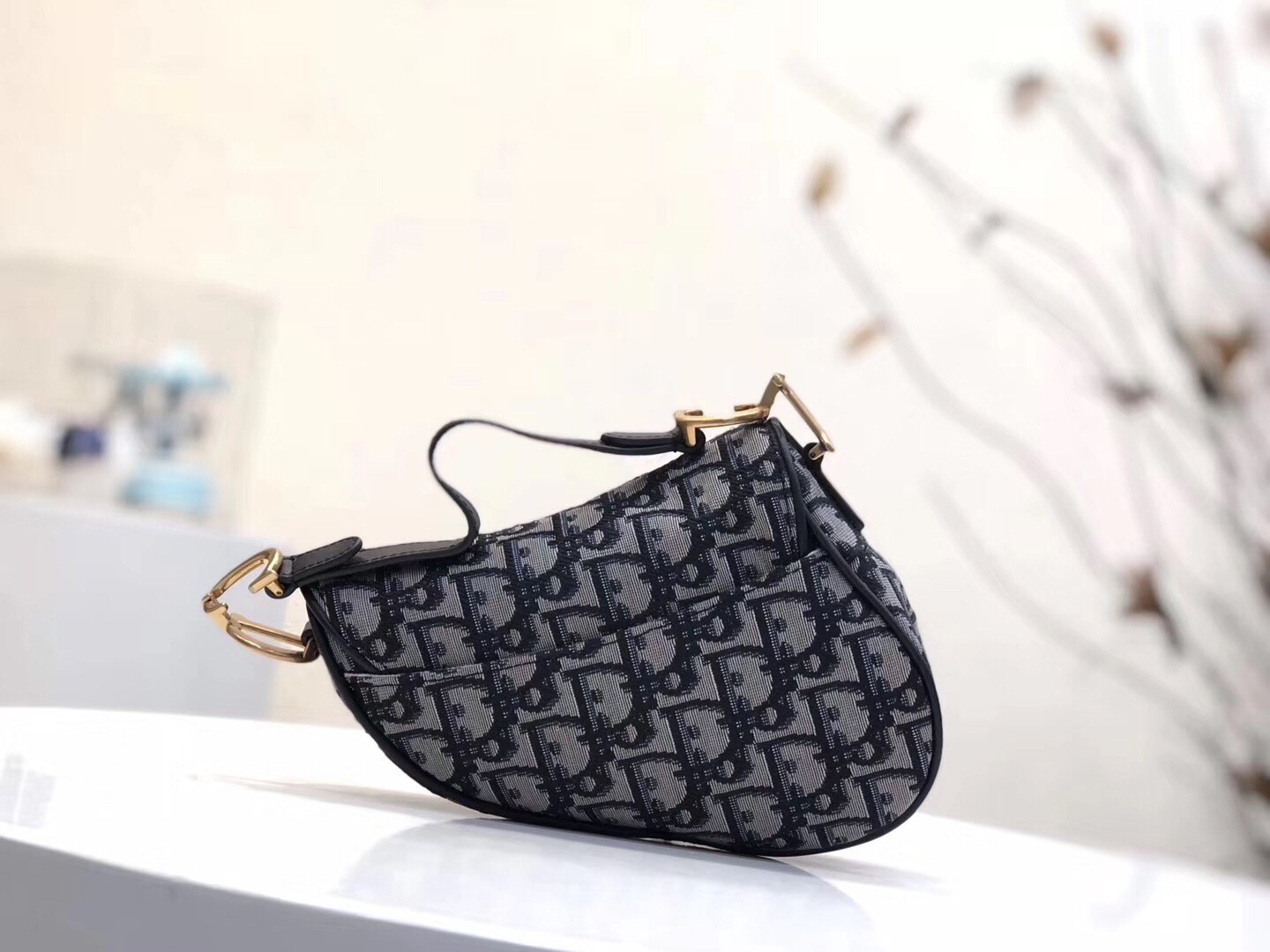 D*or mini saddle bag in blue oblique jacquard canvas
