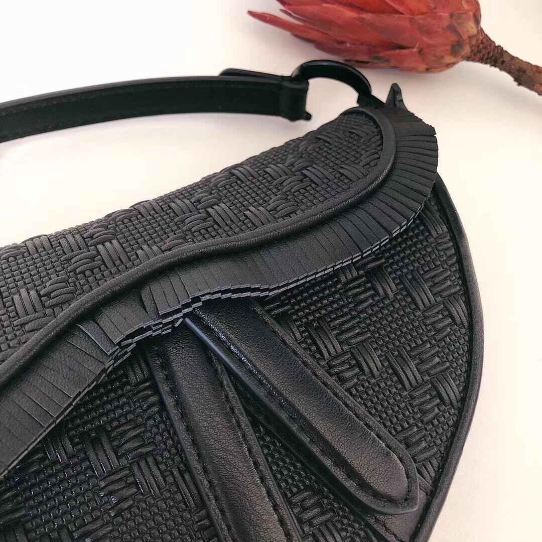 D*or saddle bag in black braided leather strips with fringe