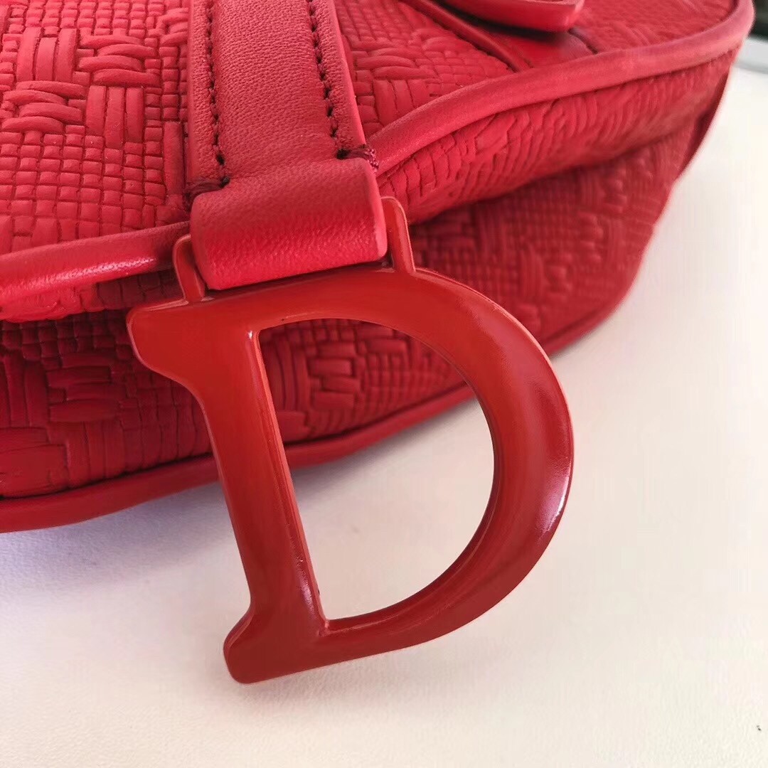 D*or saddle bag in red braided leather strips with fringe