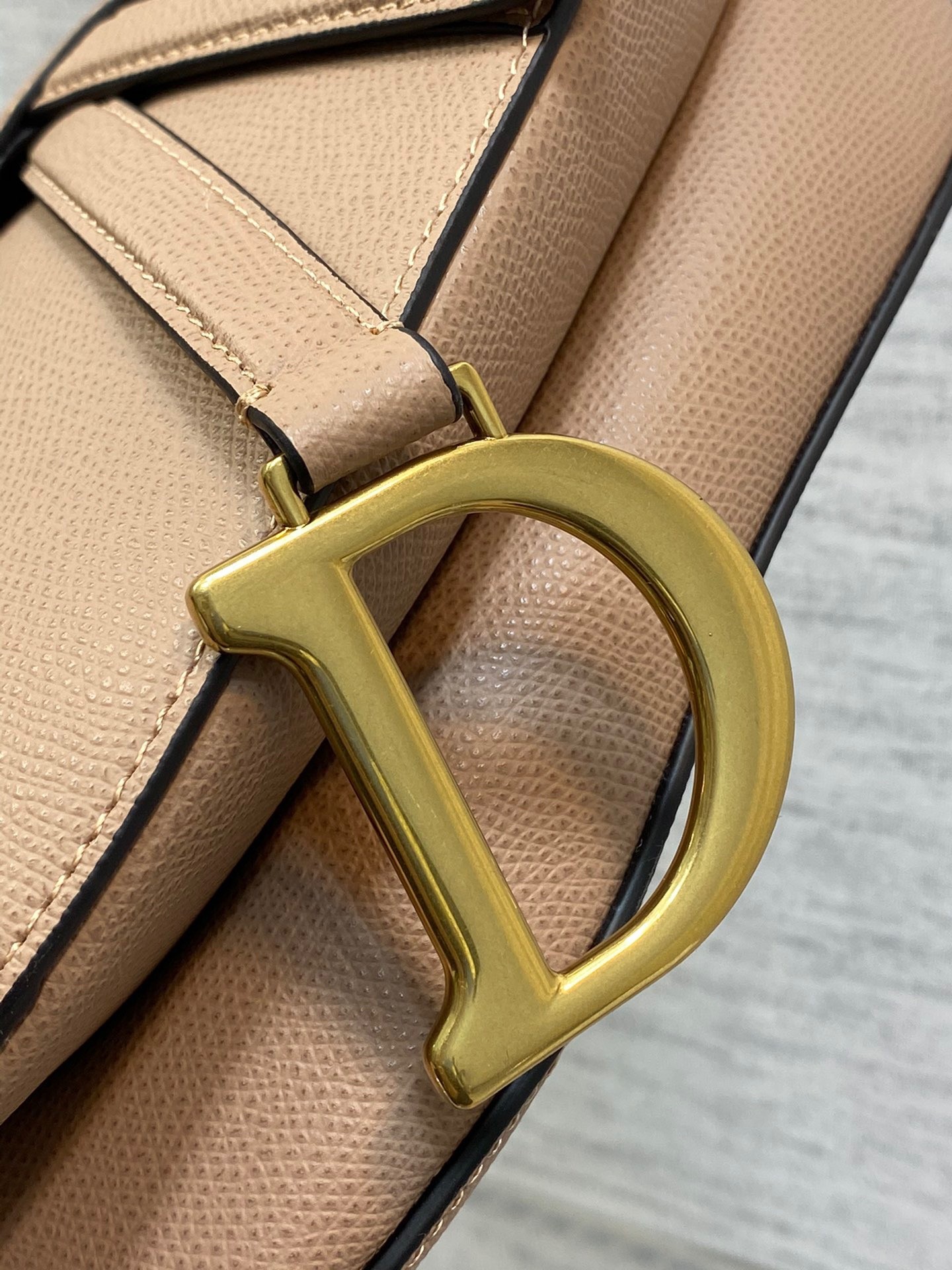D*or saddle bag with strap in blush grained calfskin