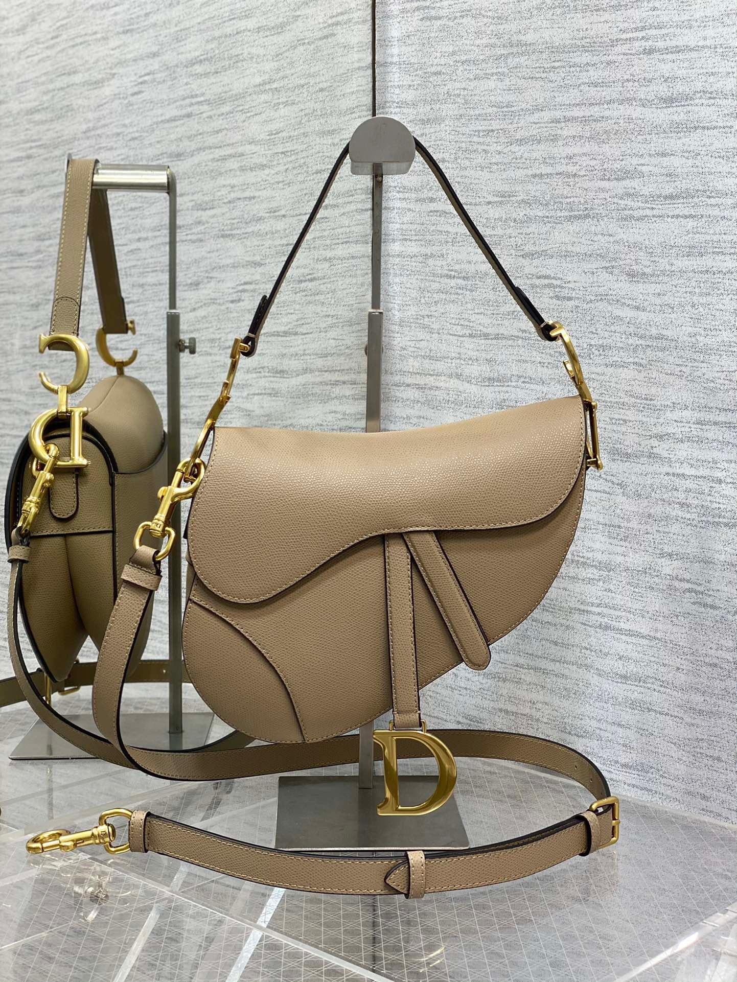 D*or saddle bag with strap in sand grained calfskin