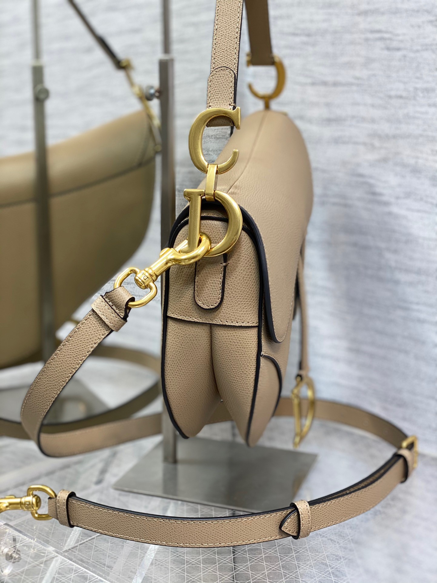 D*or saddle bag with strap in sand grained calfskin