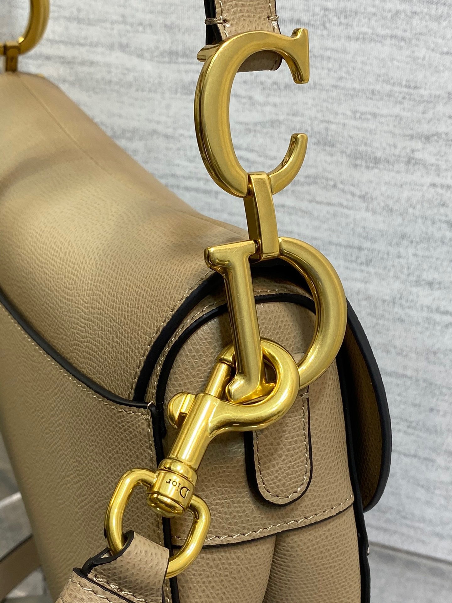 D*or saddle bag with strap in sand grained calfskin