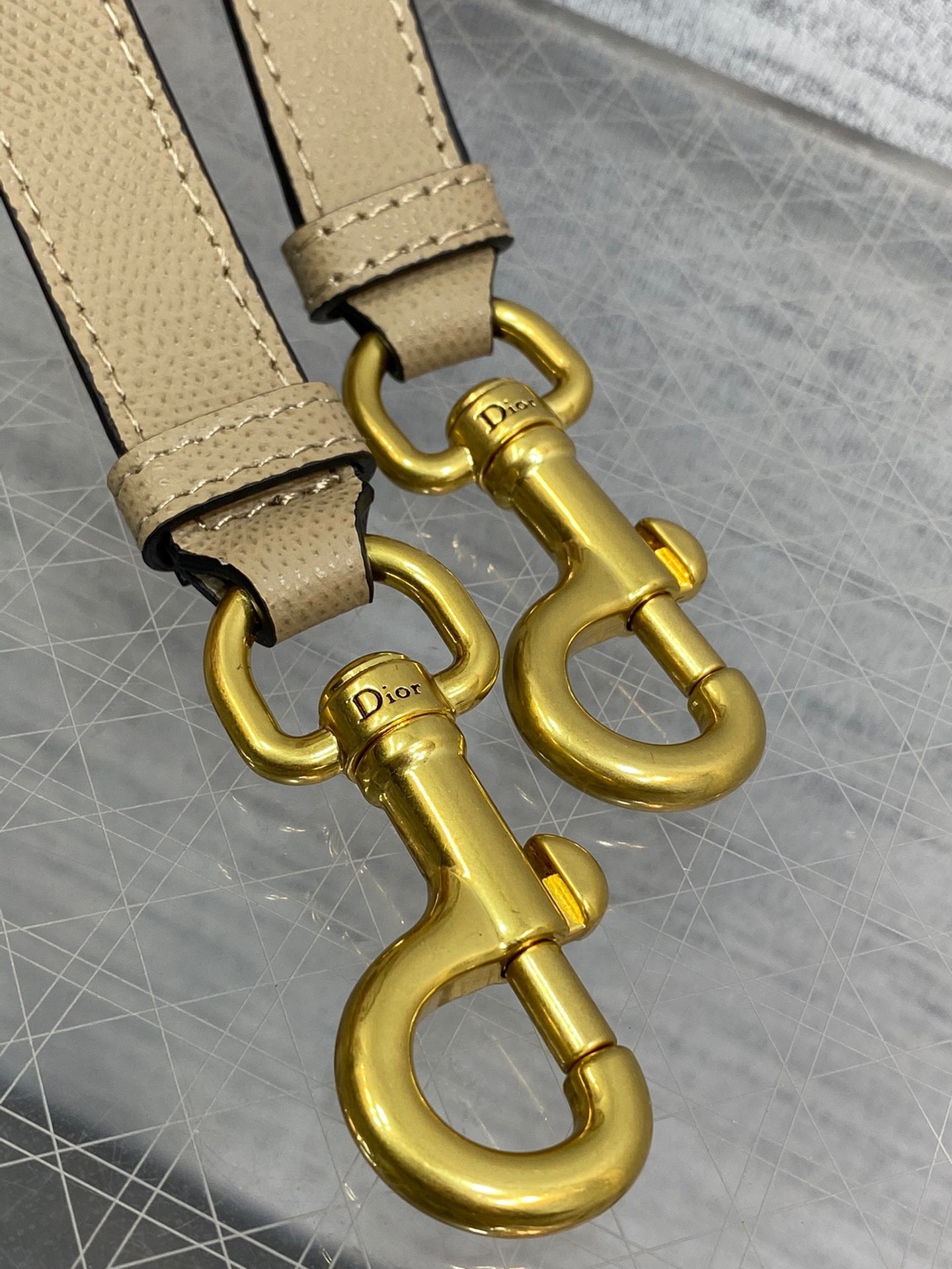 D*or saddle bag with strap in sand grained calfskin