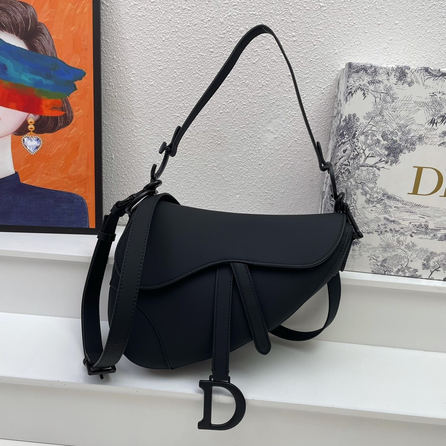 D*or saddle bag with strap in black ultramatte calfskin