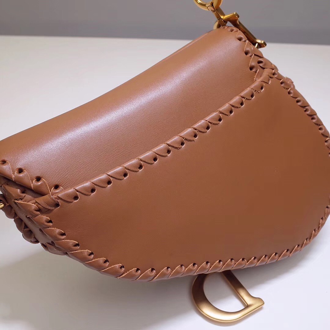 D*or saddle bag in brown calfskin with threaded edges