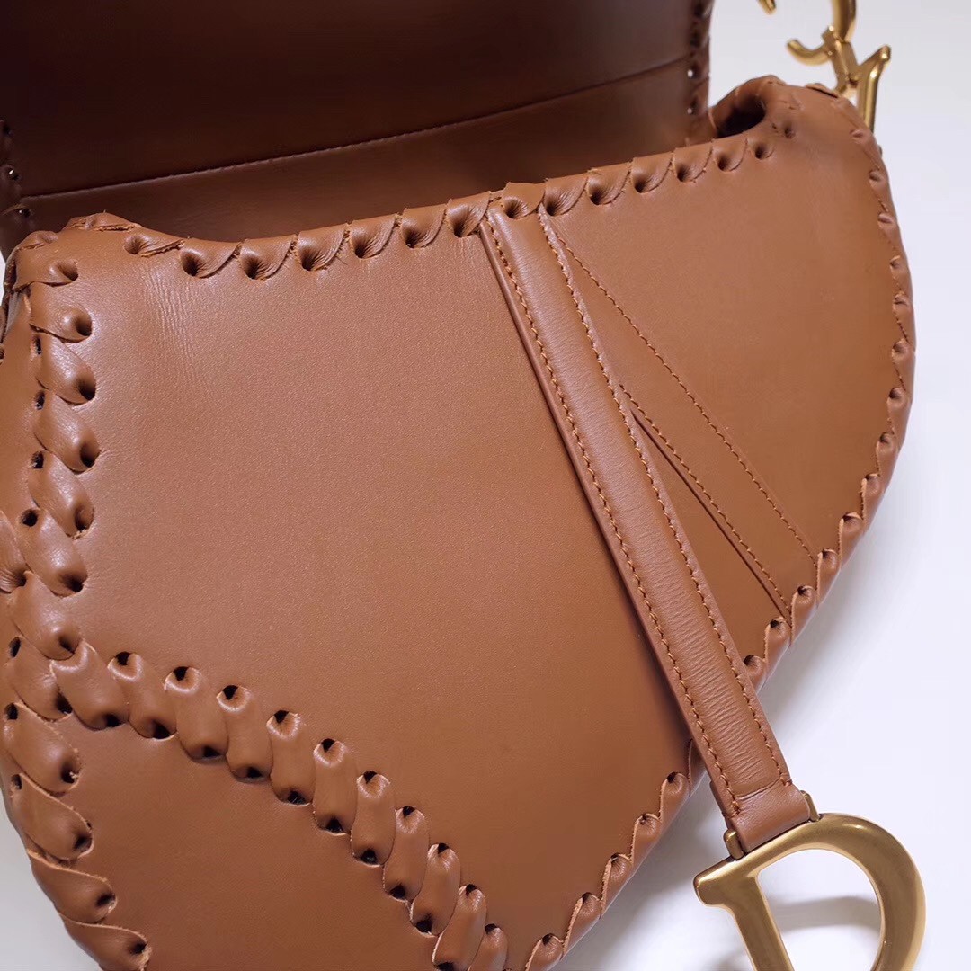 D*or saddle bag in brown calfskin with threaded edges