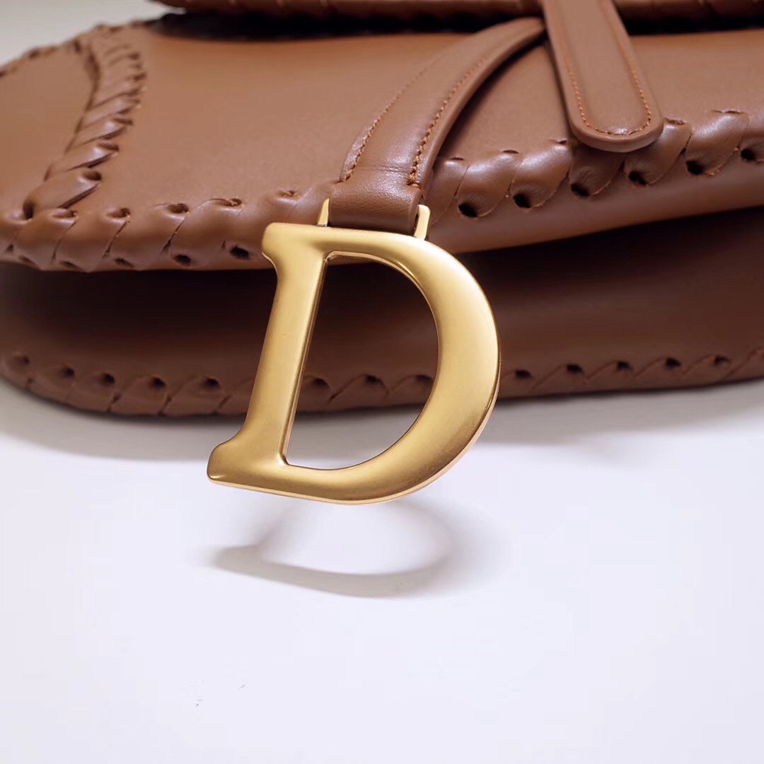 D*or saddle bag in brown calfskin with threaded edges