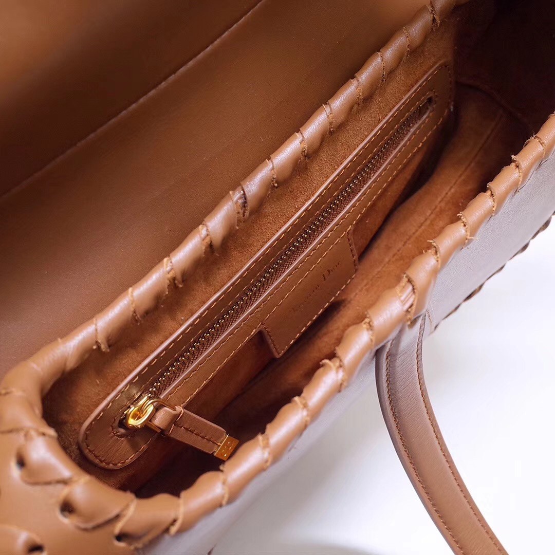 D*or saddle bag in brown calfskin with threaded edges