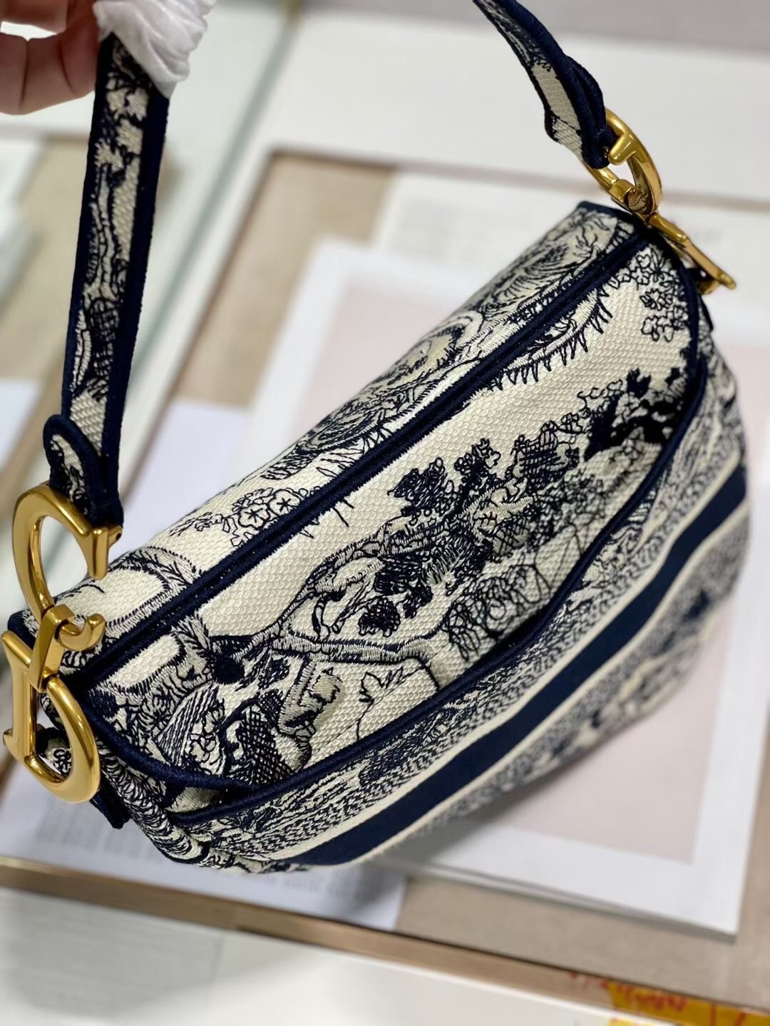 D*or saddle bag in blue toile de jouy embroidery