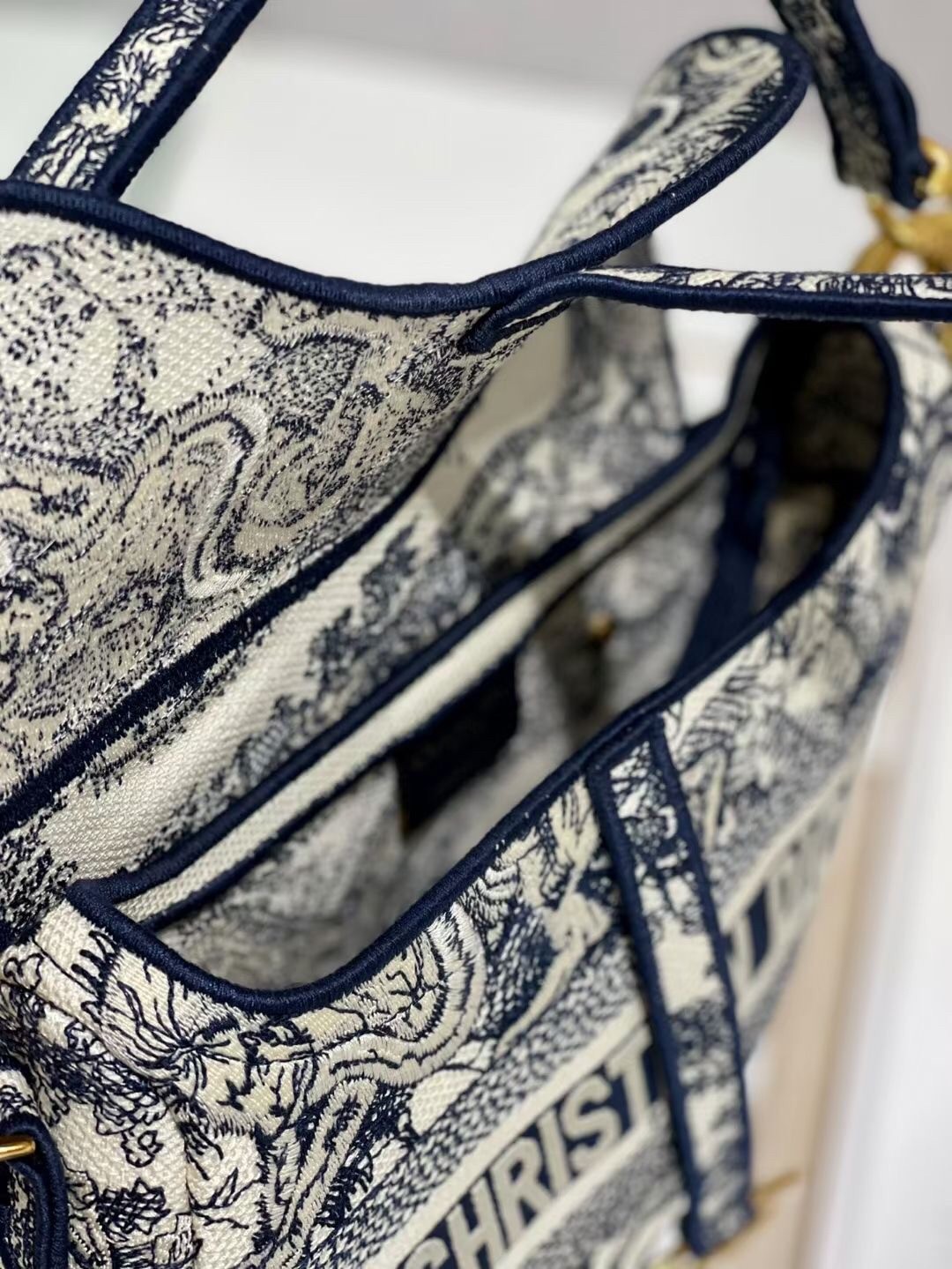 D*or saddle bag in blue toile de jouy embroidery