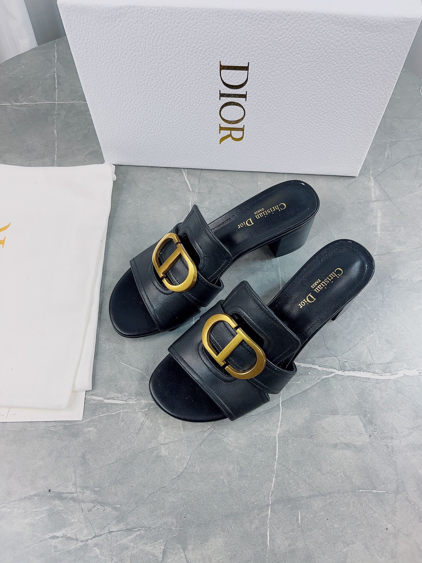 D*or 30 montaigne heeled slides in black calfskin