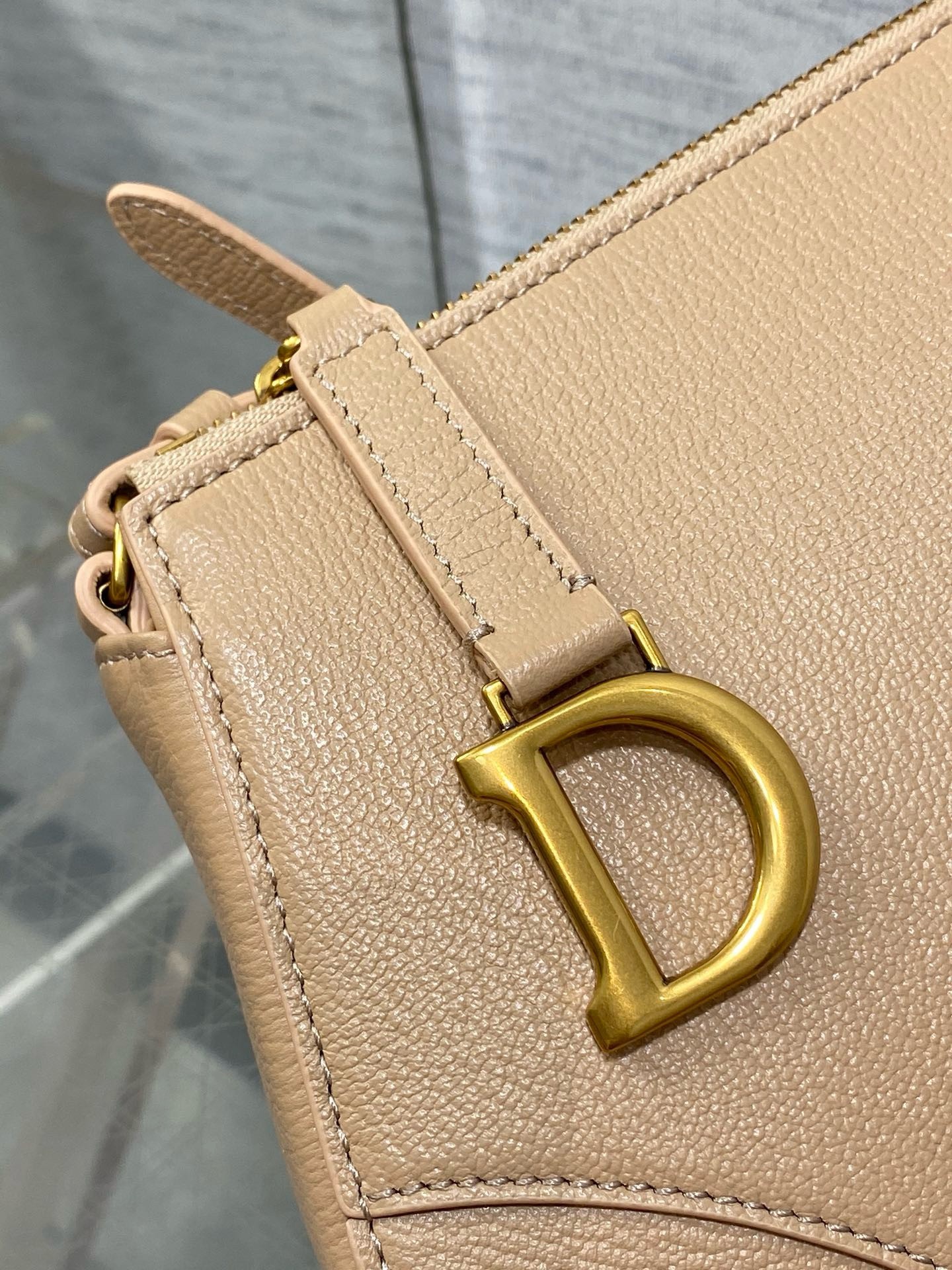 D*or saddle rodeo pouch in biscuit goatskin