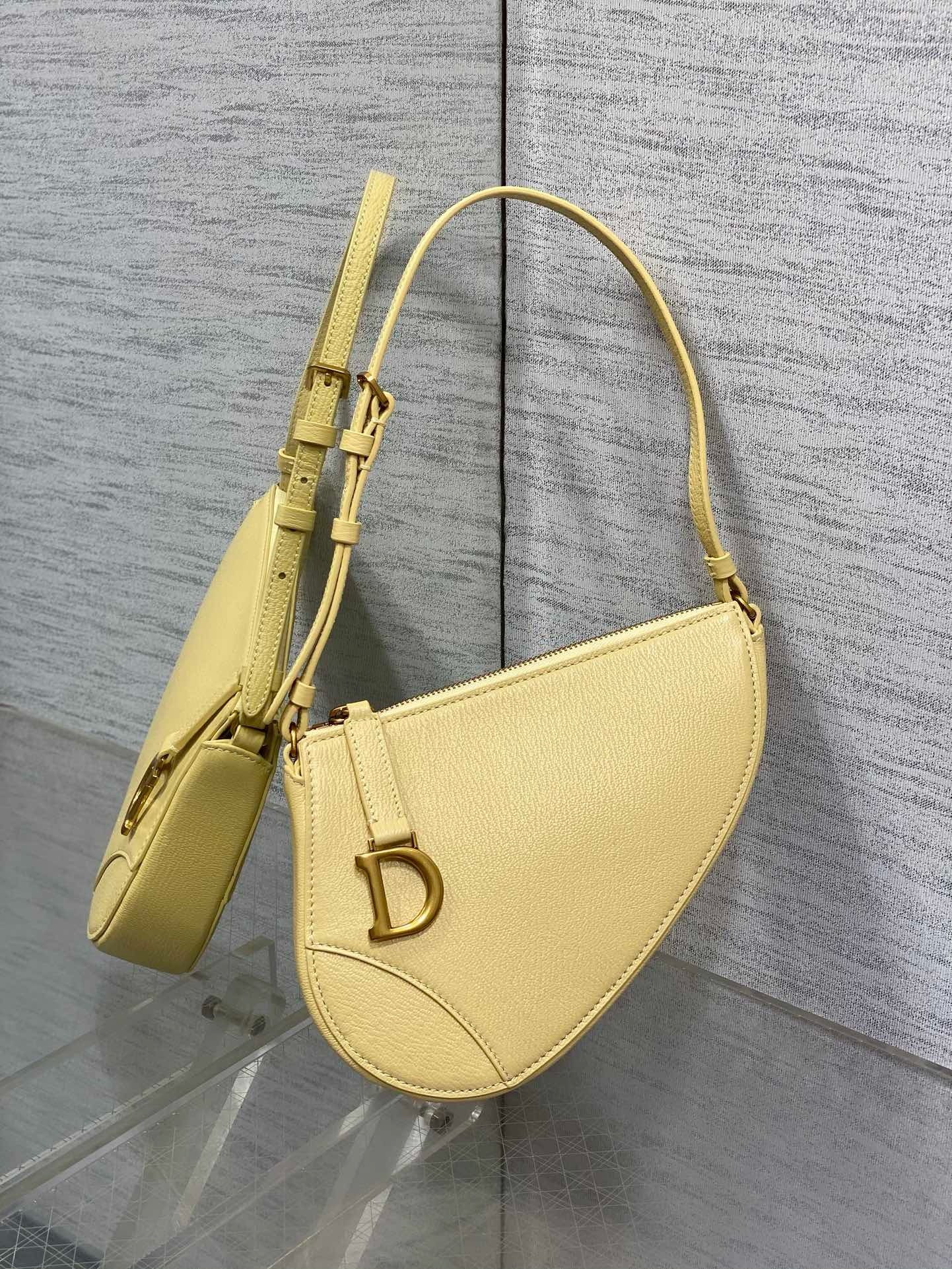 D*or saddle rodeo pouch in yellow goatskin