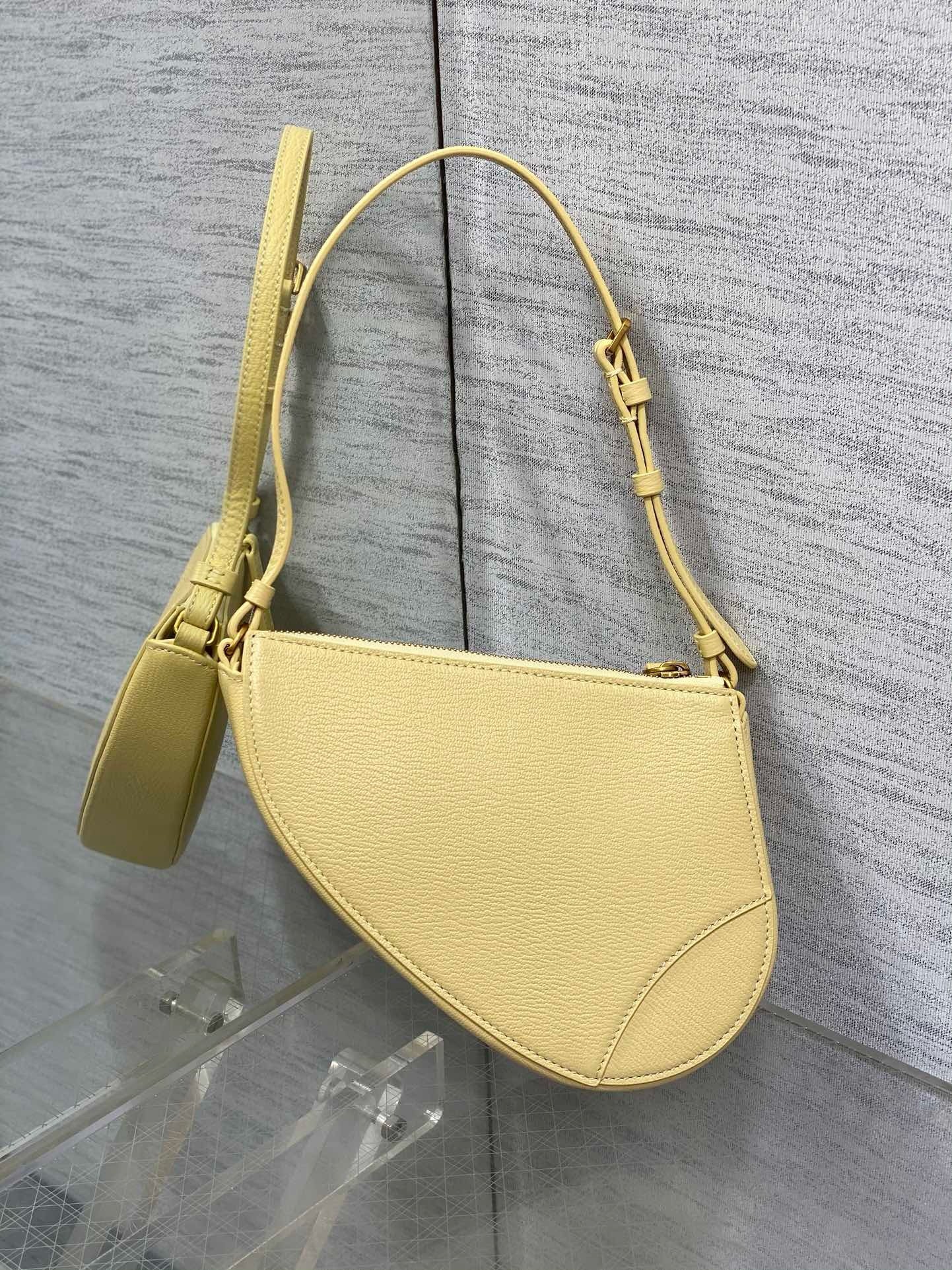 D*or saddle rodeo pouch in yellow goatskin