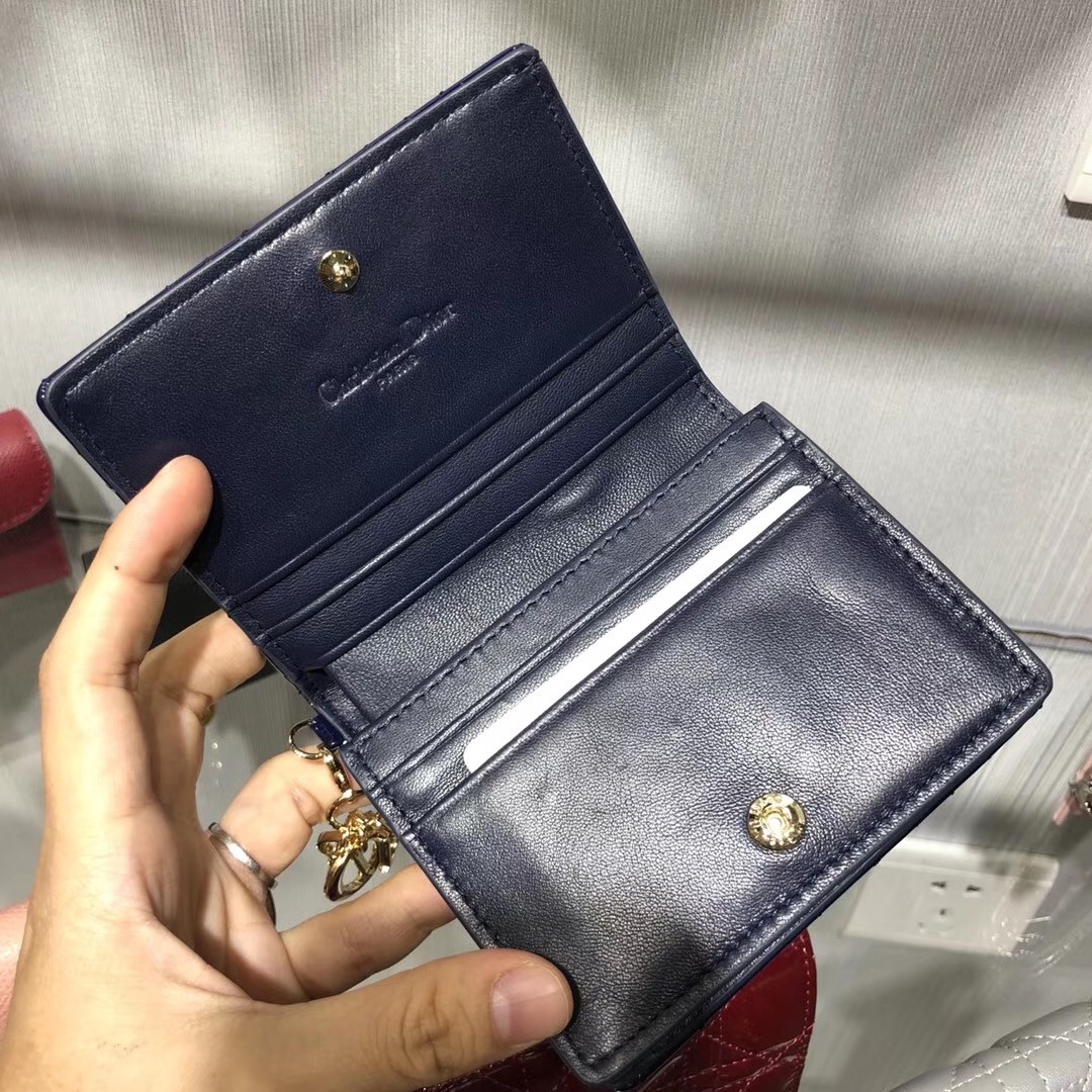 D*or mini lady D*or wallet in indigo blue patent leather