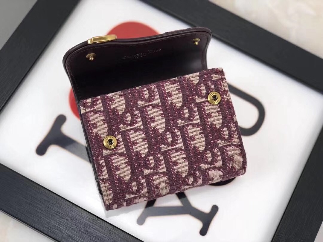 D*or mini saddle tri-fold wallet in bordeaux oblique canvas