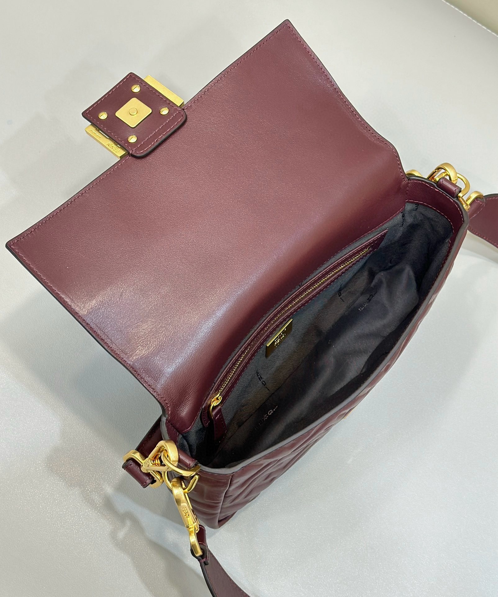 F**di medium baguette bag in burgundy ff nappa leather