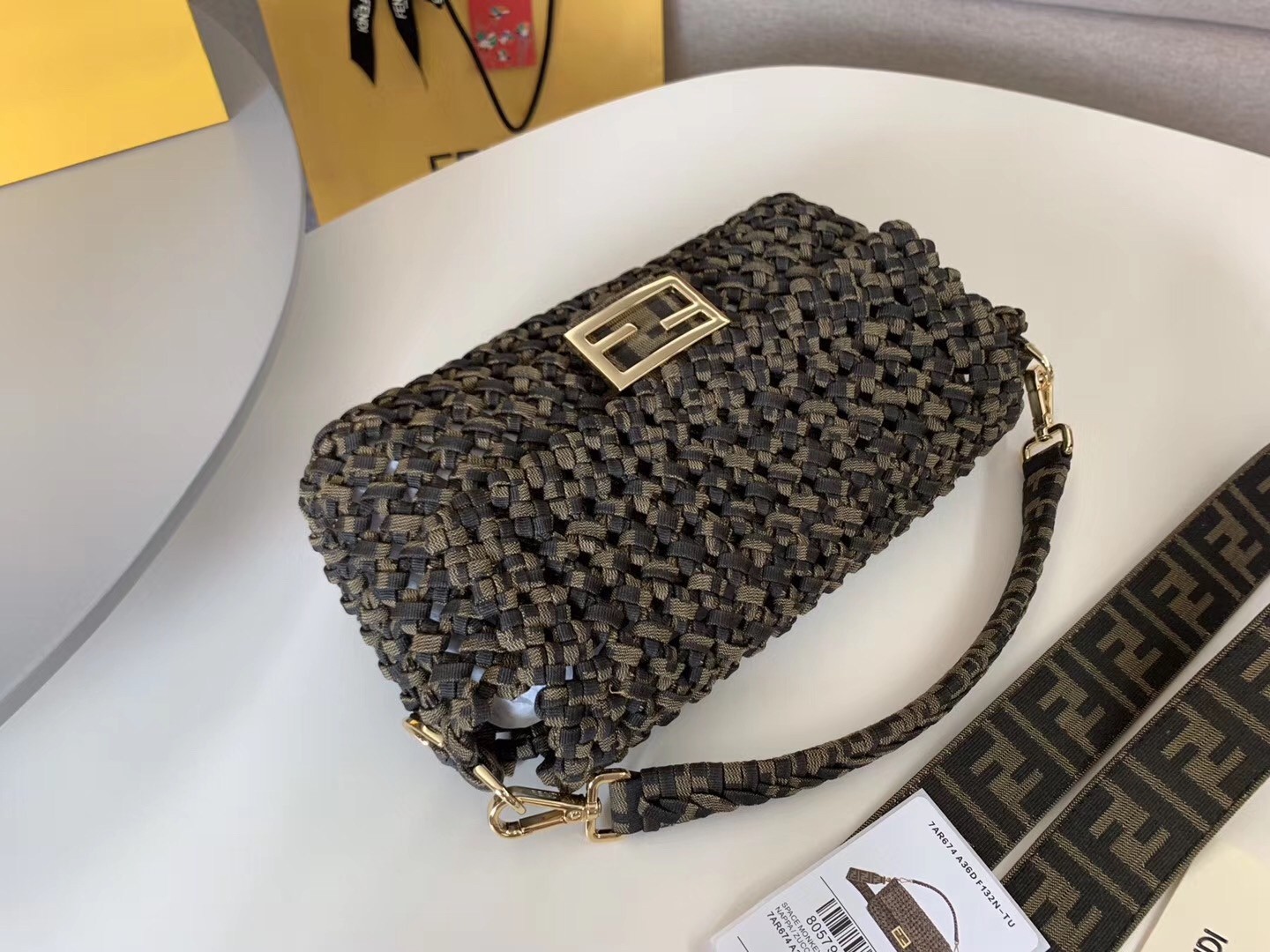F**di baguette medium bag in woven strips