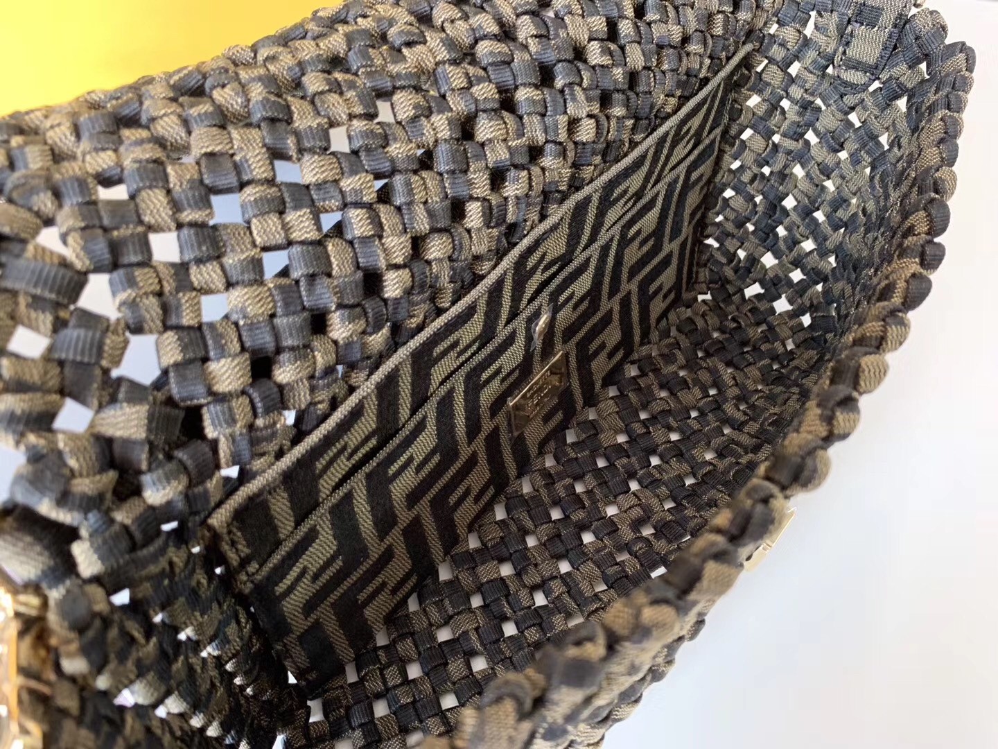 F**di baguette medium bag in woven strips