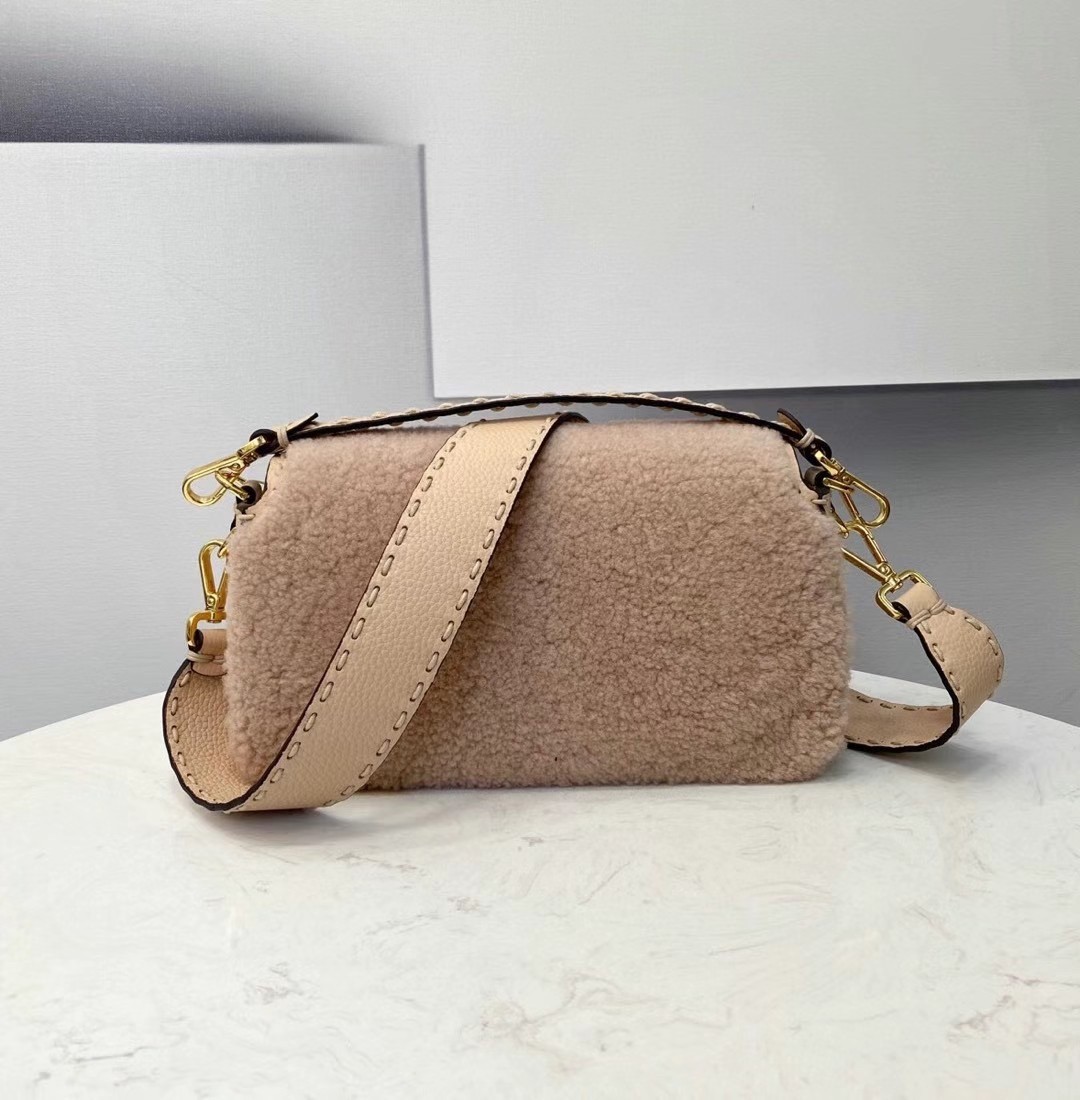 F**di medium baguette bag in beige shearling