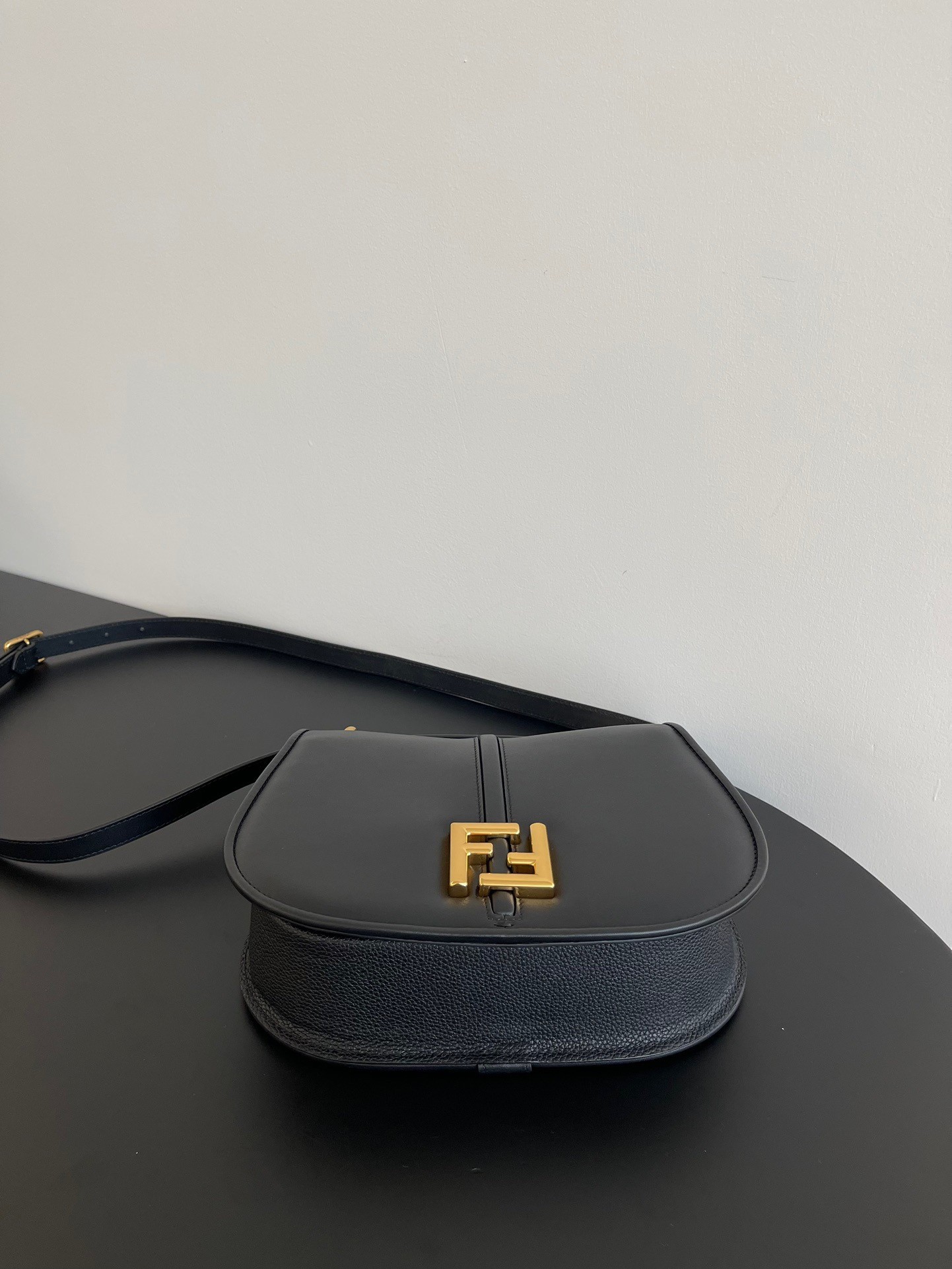 F**di c’mon medium bag in black calfskin