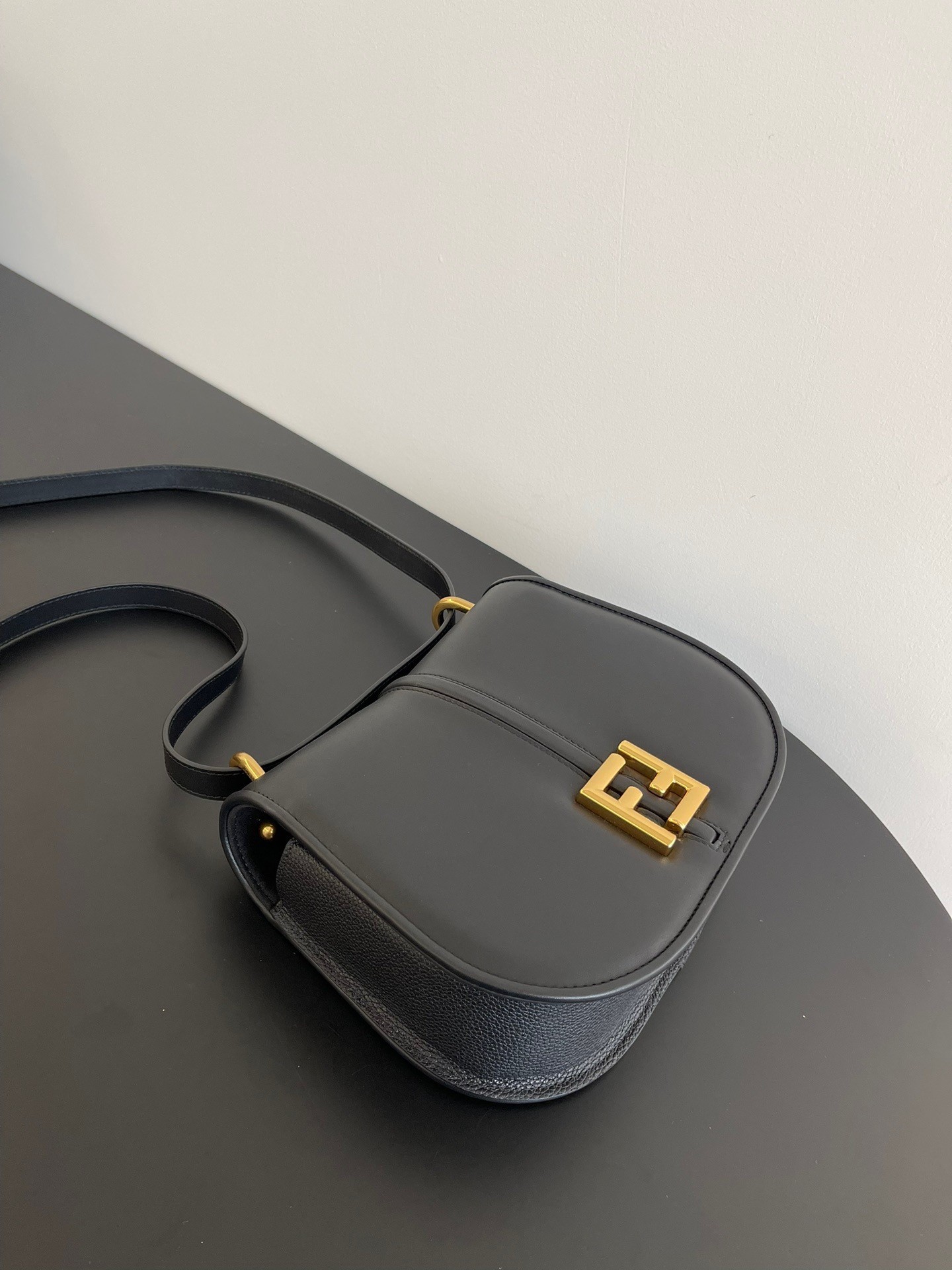 F**di c’mon medium bag in black calfskin