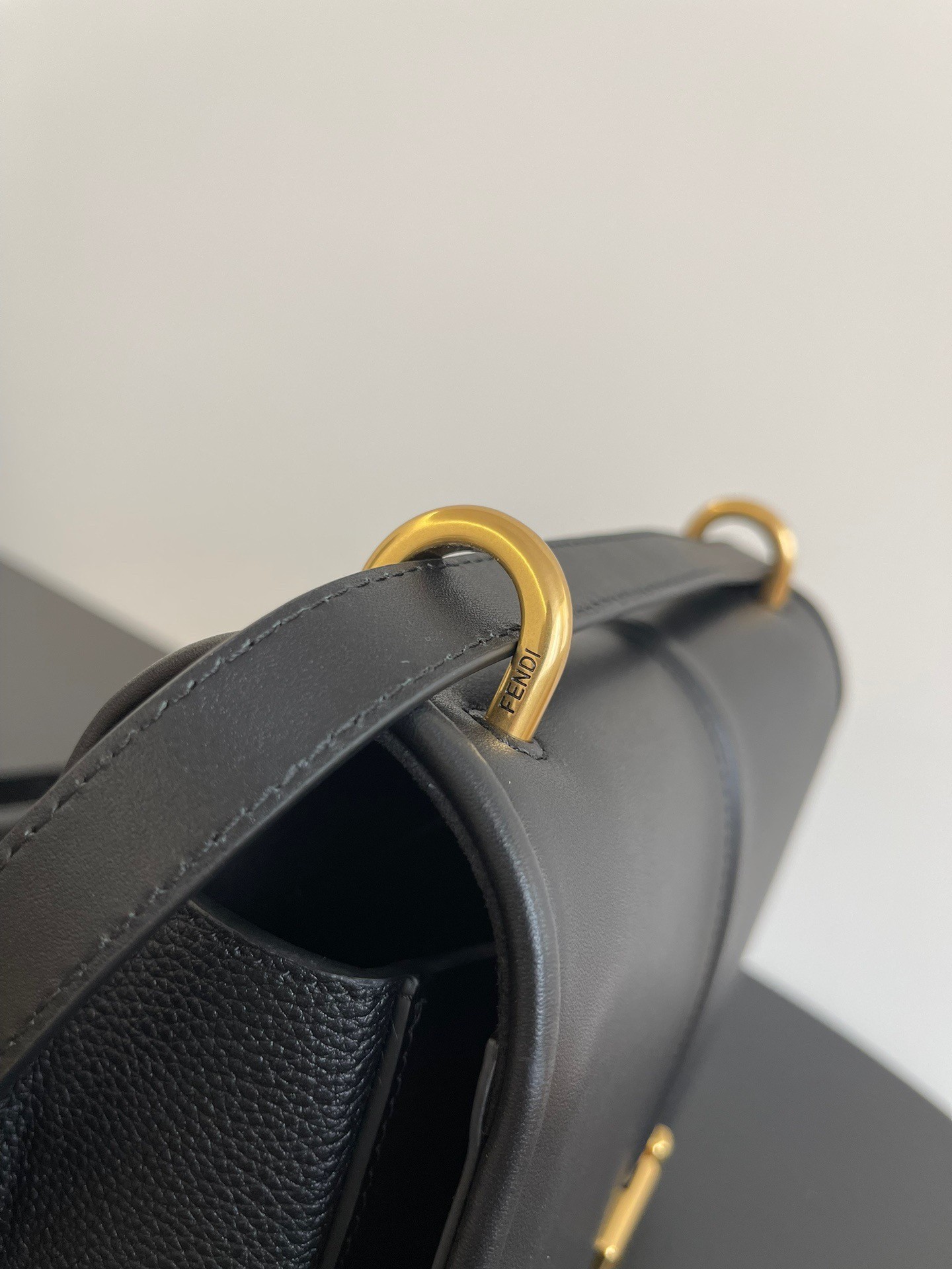 F**di c’mon medium bag in black calfskin