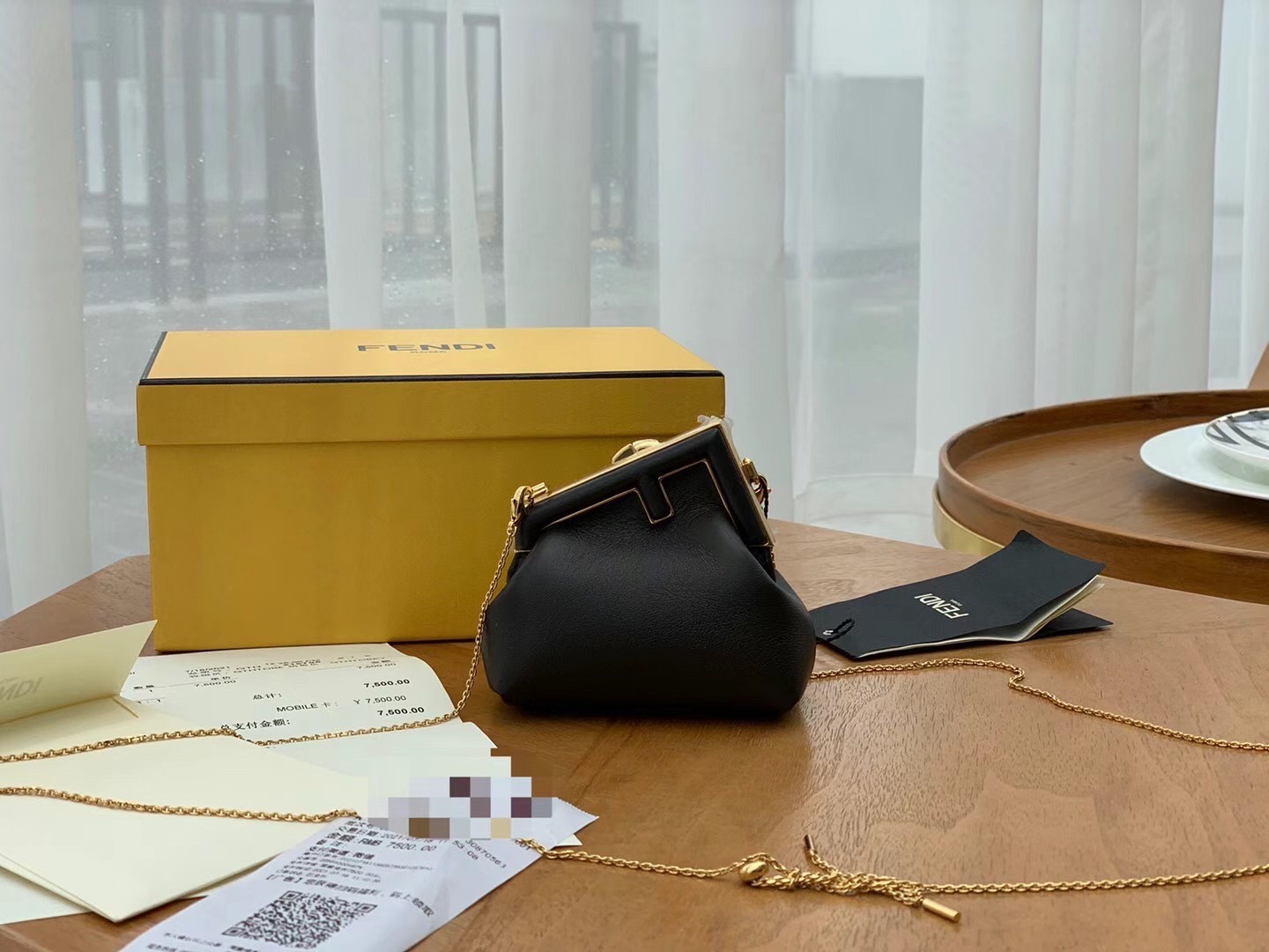 F**di first nano charm bag in black nappa leather